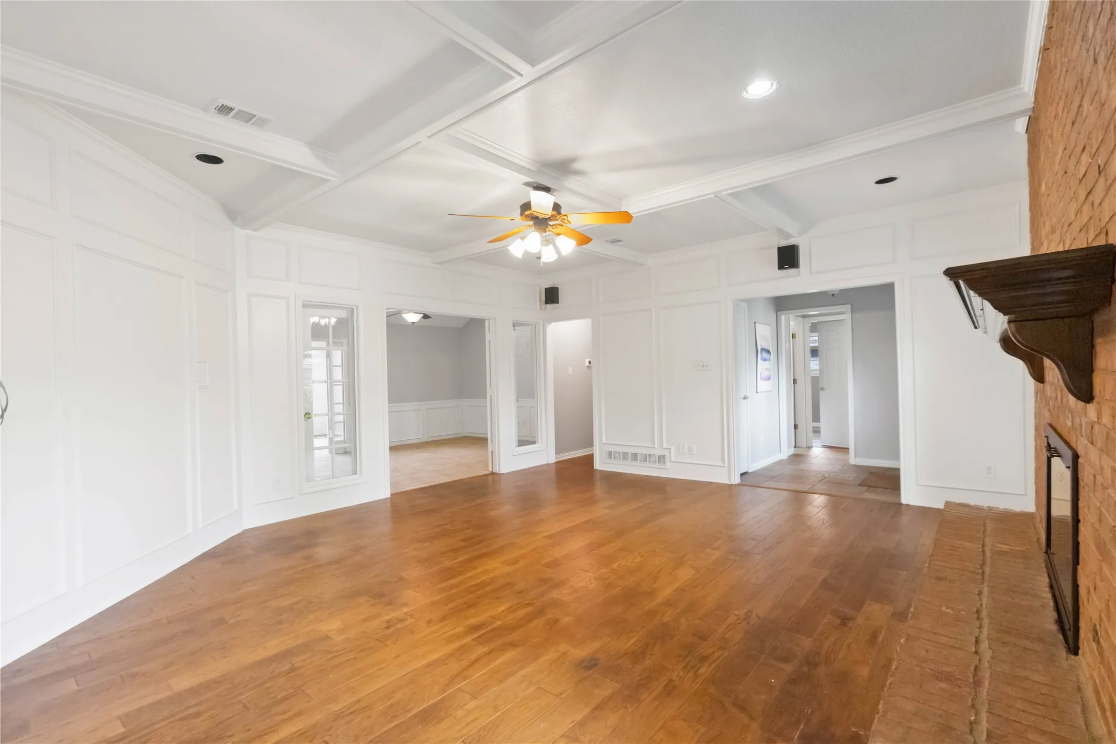 Secondary living area at 200 Sunny Crest Dr, Murphy TX in Timbers 3 featuring hardwood flooring and open flow.