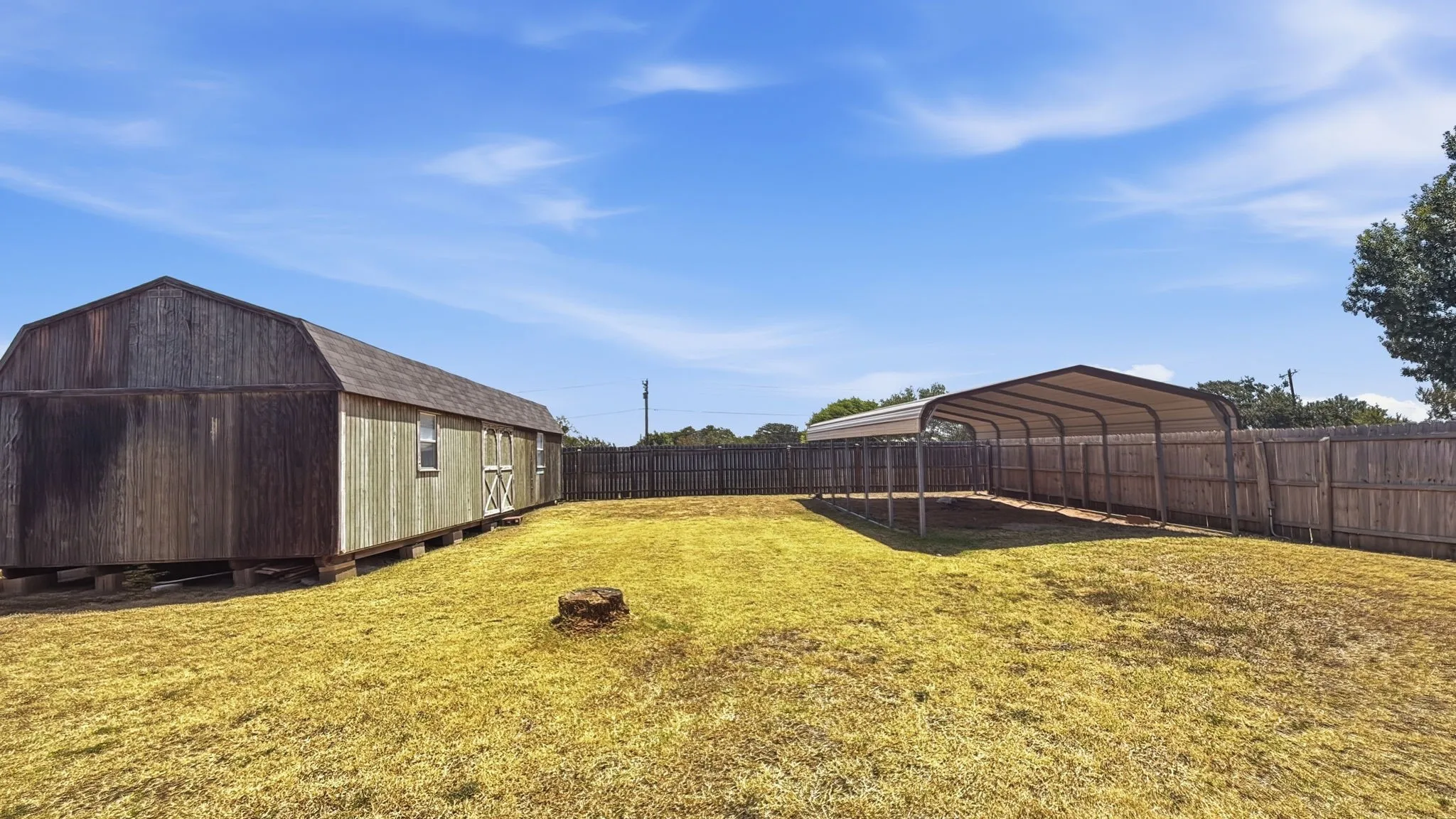 Lot 2 Backyard with carport/barn