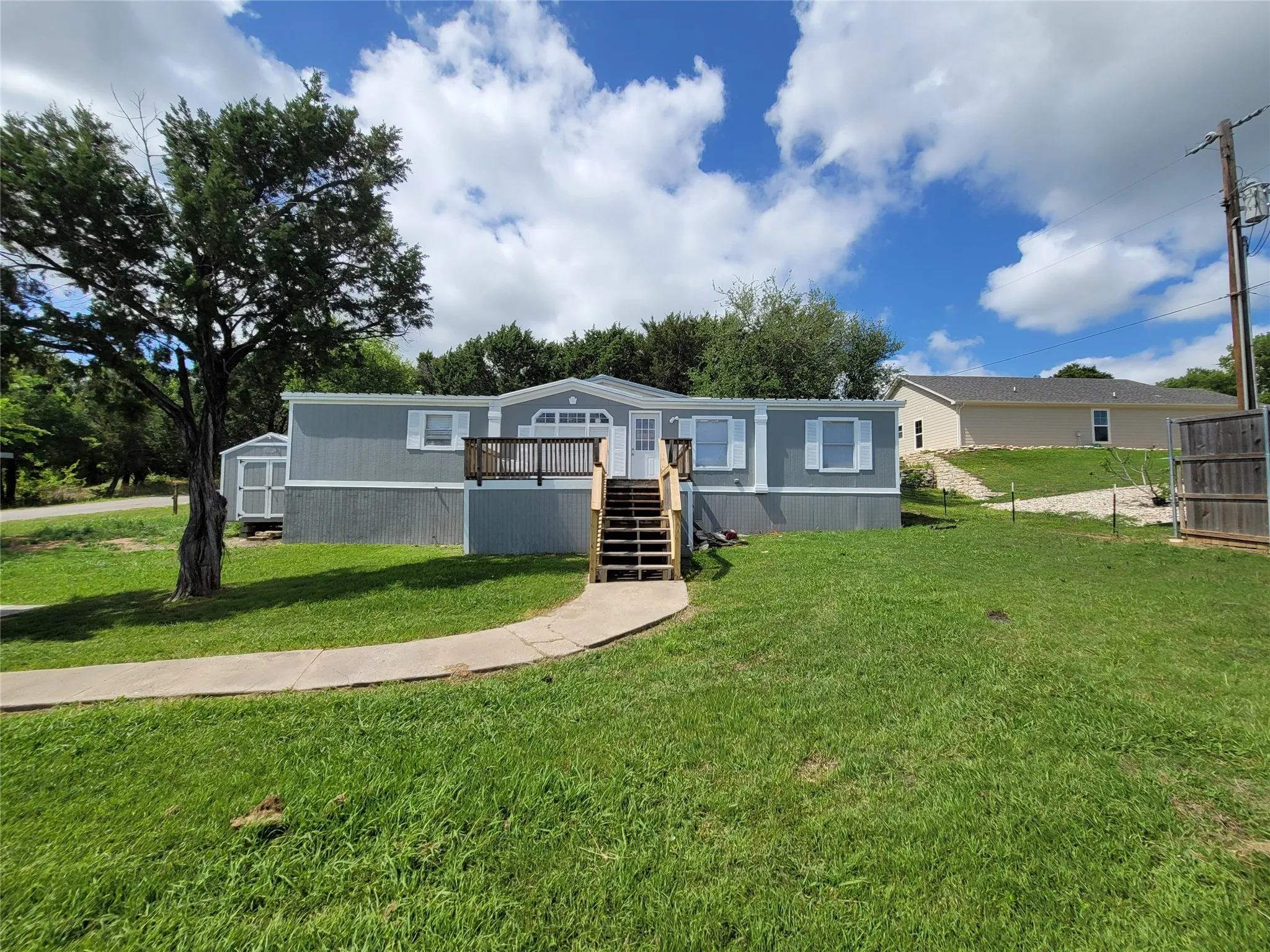 Mobile Home For Sale in Hood County , 902 DEVILS RIVER Drive, Granbury, Texas 76048, 3 Bedrooms, 2 Bathrooms, Garage spaces, 1,568 Sqft, built in 2002, Price $199,900, mls#21238222, Real Estate Agent in Granbury, Homes For Sale in Hood county, Homes For Sale in Granbury, Realtor in Granbury Texas, Real Estate Brokerage Independent Realty Texas, Luminita Cordes Realtor