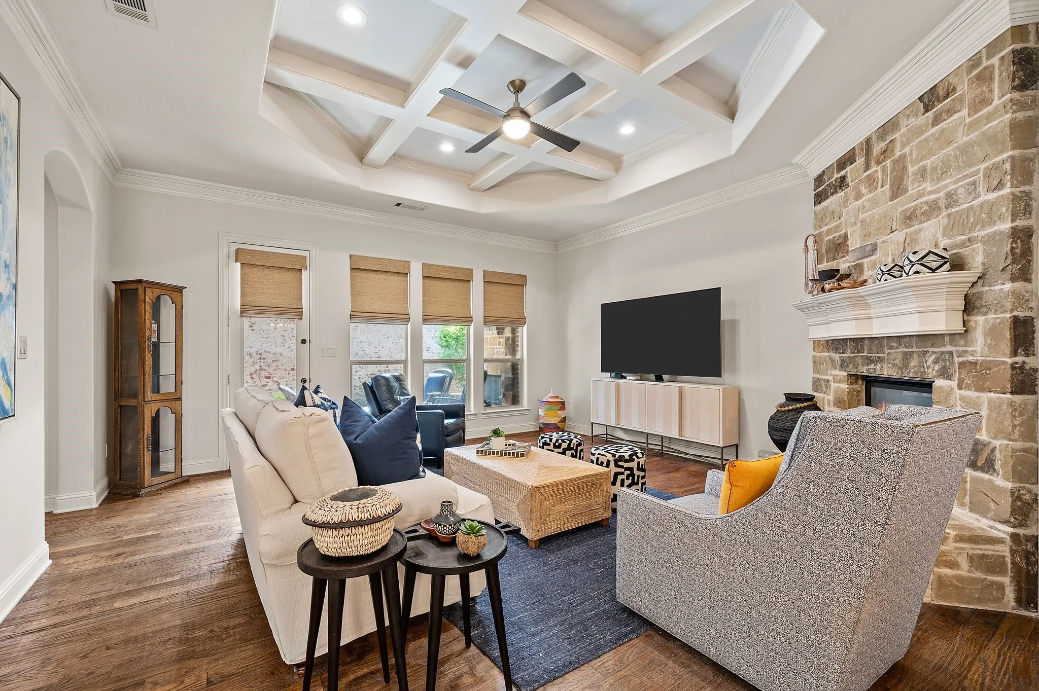 Open-concept living area with abundant natural light and seamless flow to kitchen and dining.