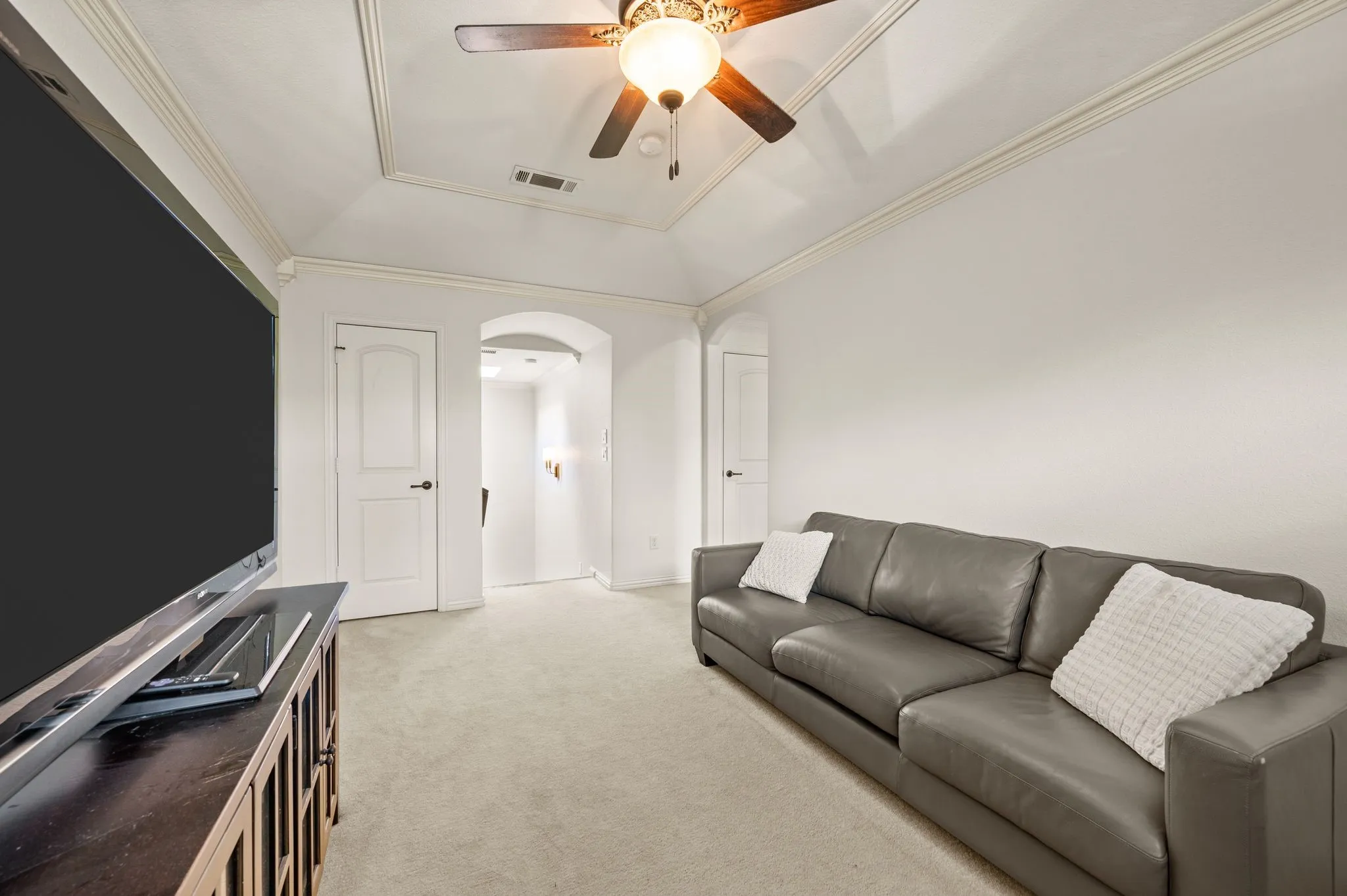 Second view of upstairs living space offering flexible layout for media or lounge use