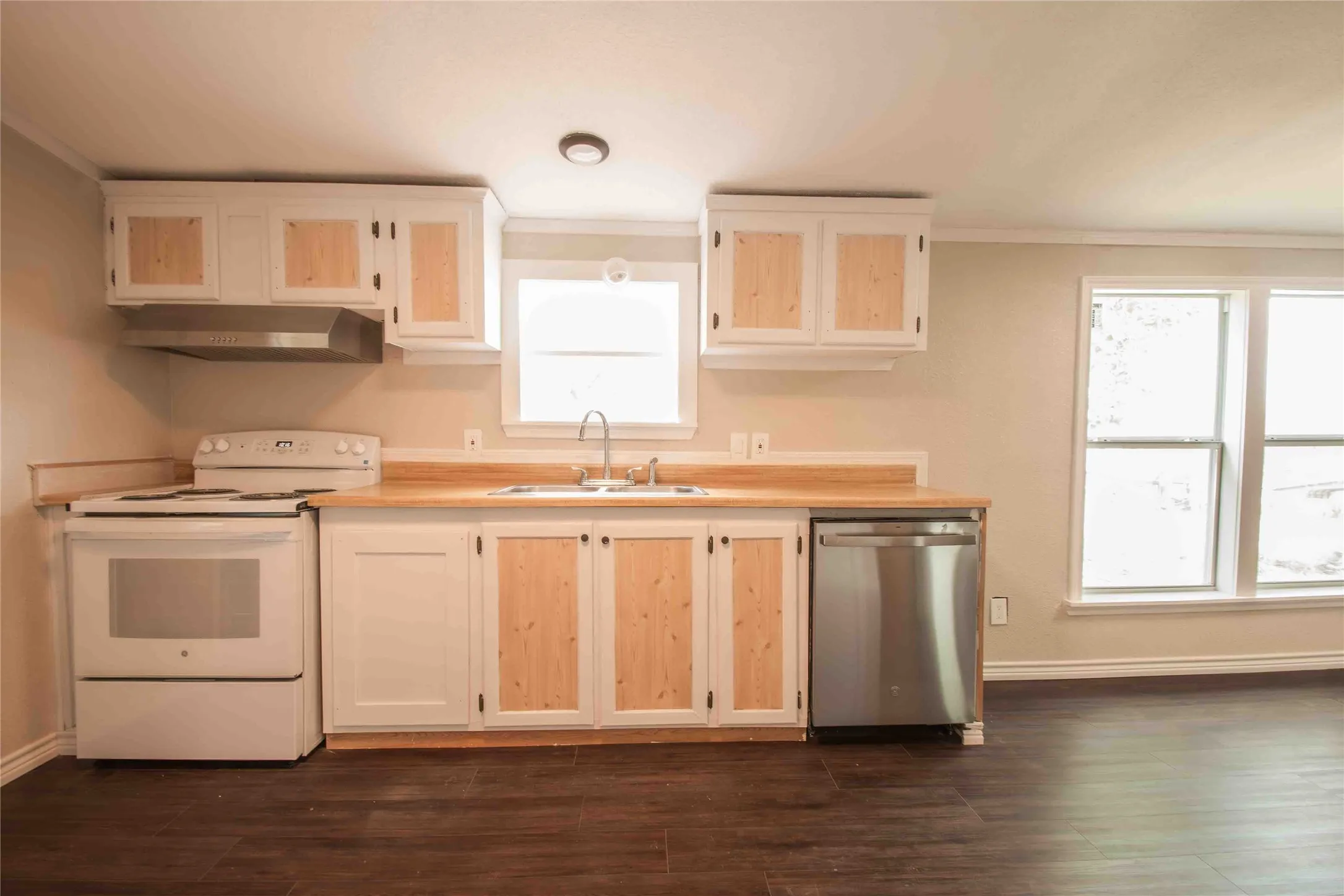 View of cabinets with appliances