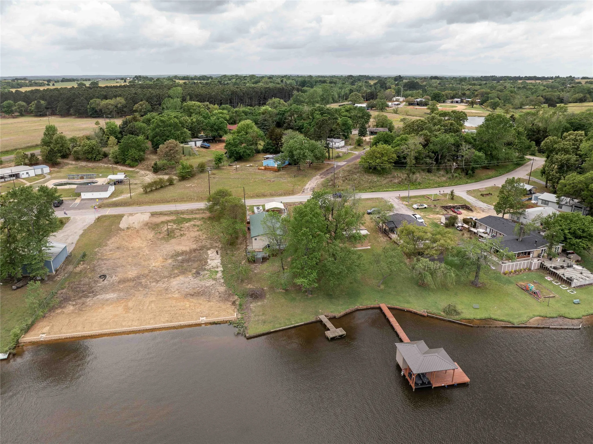 View from above lake back toward the house