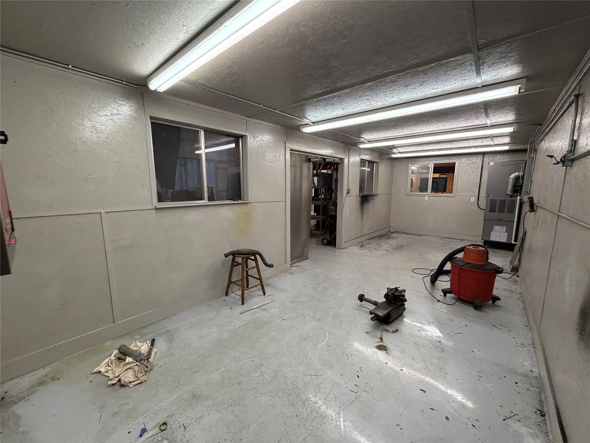 Below grade area featuring heating unit