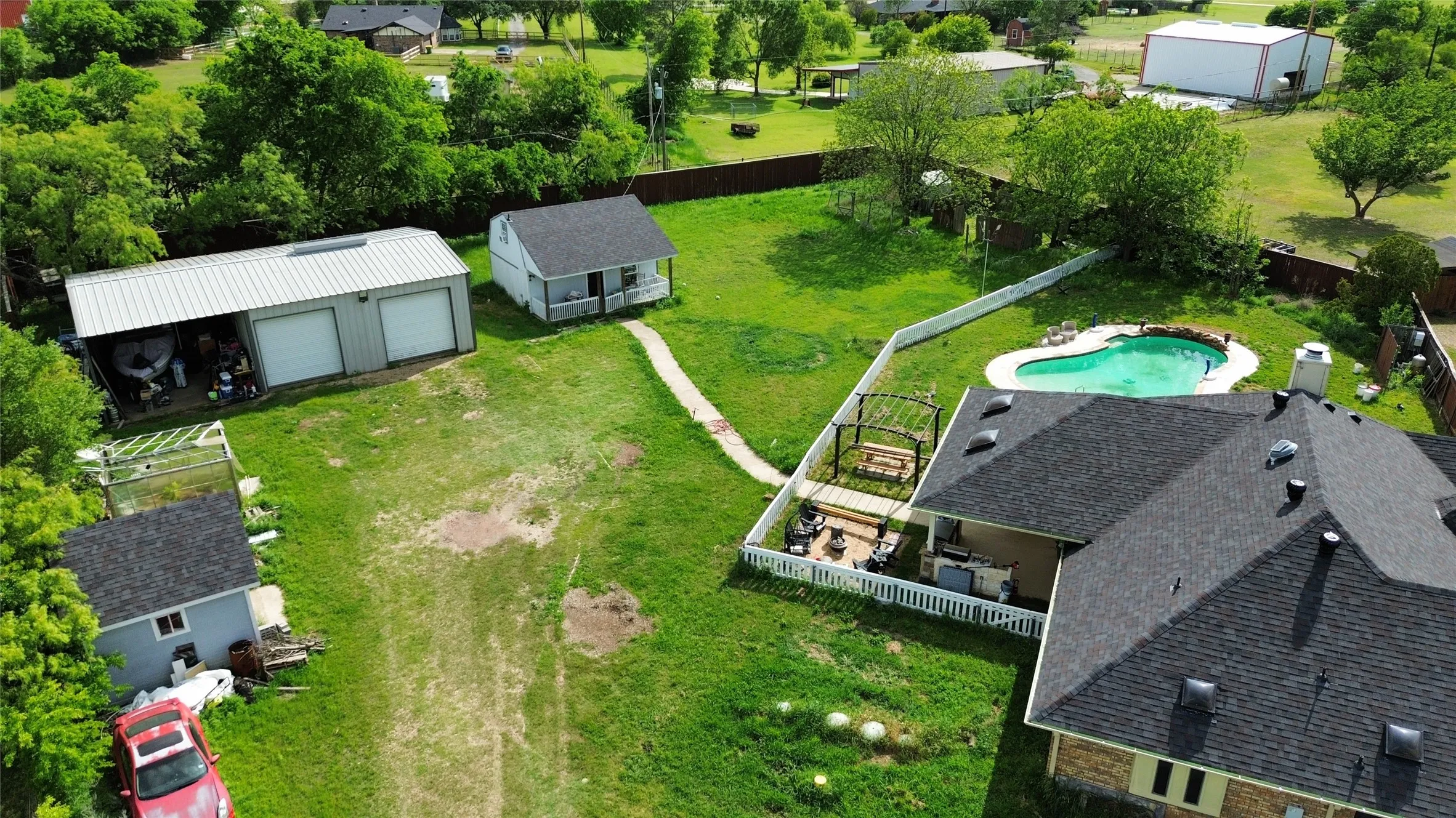 Drone / aerial view of a pool area