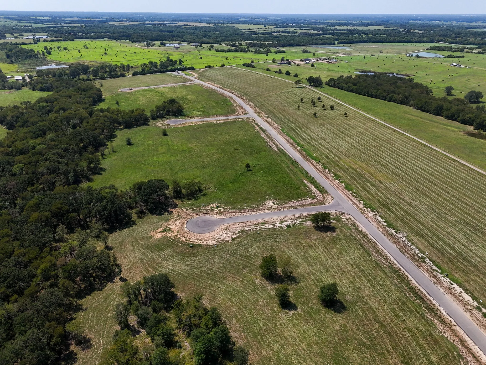 Aerial view of property's location featuring rural landscape