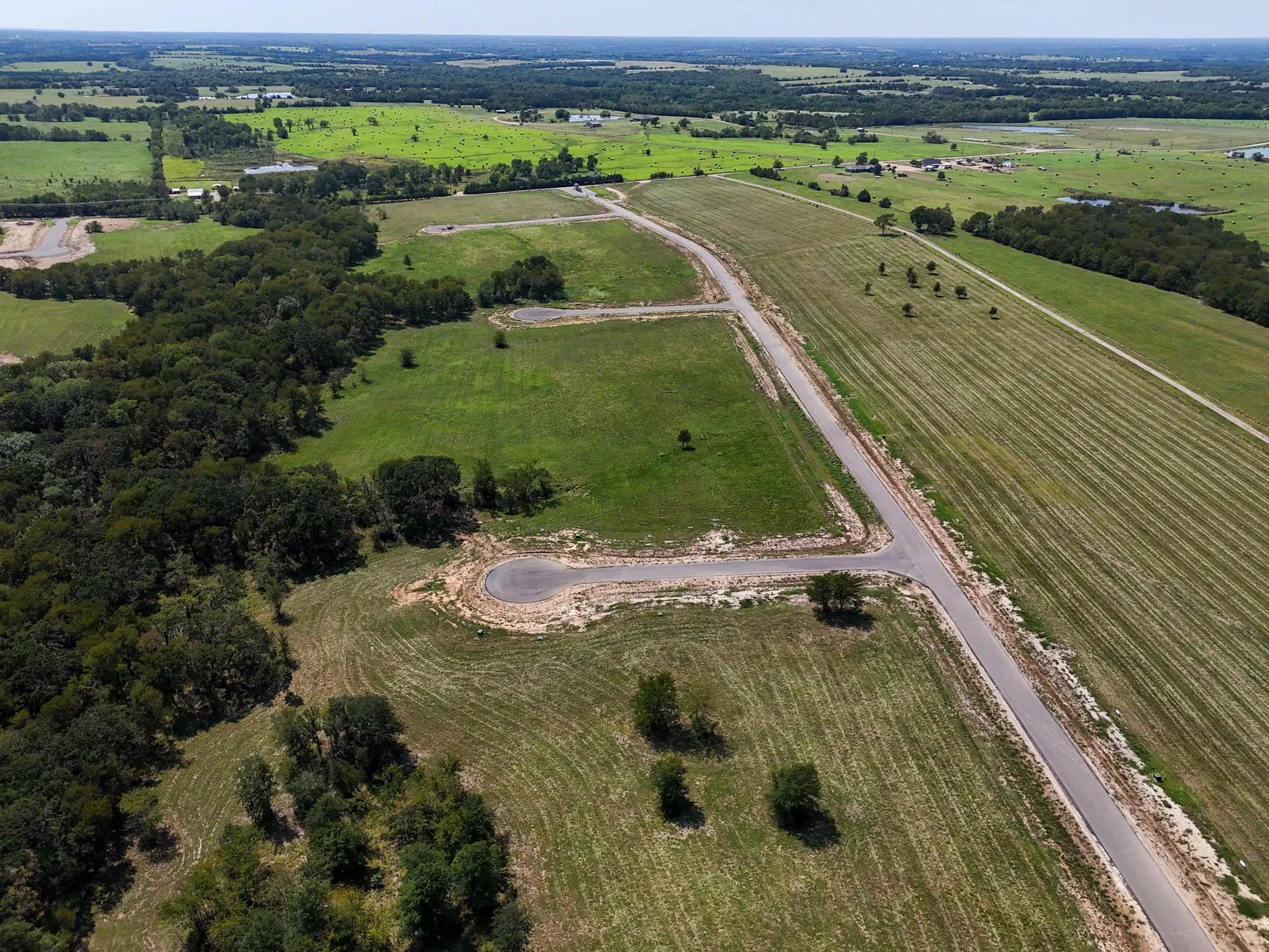 Aerial view of property's location featuring rural landscape