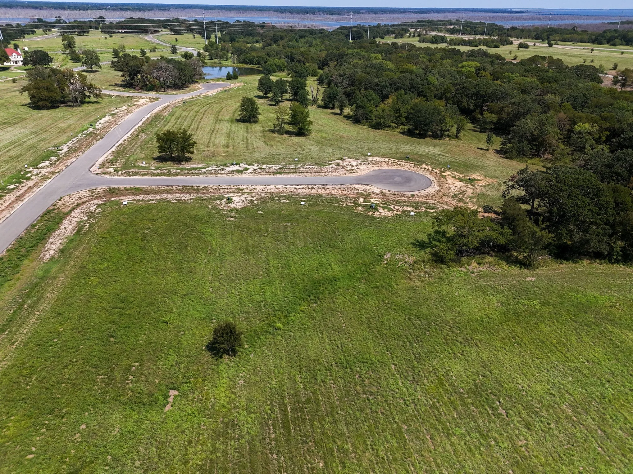 View of property location with a large body of water