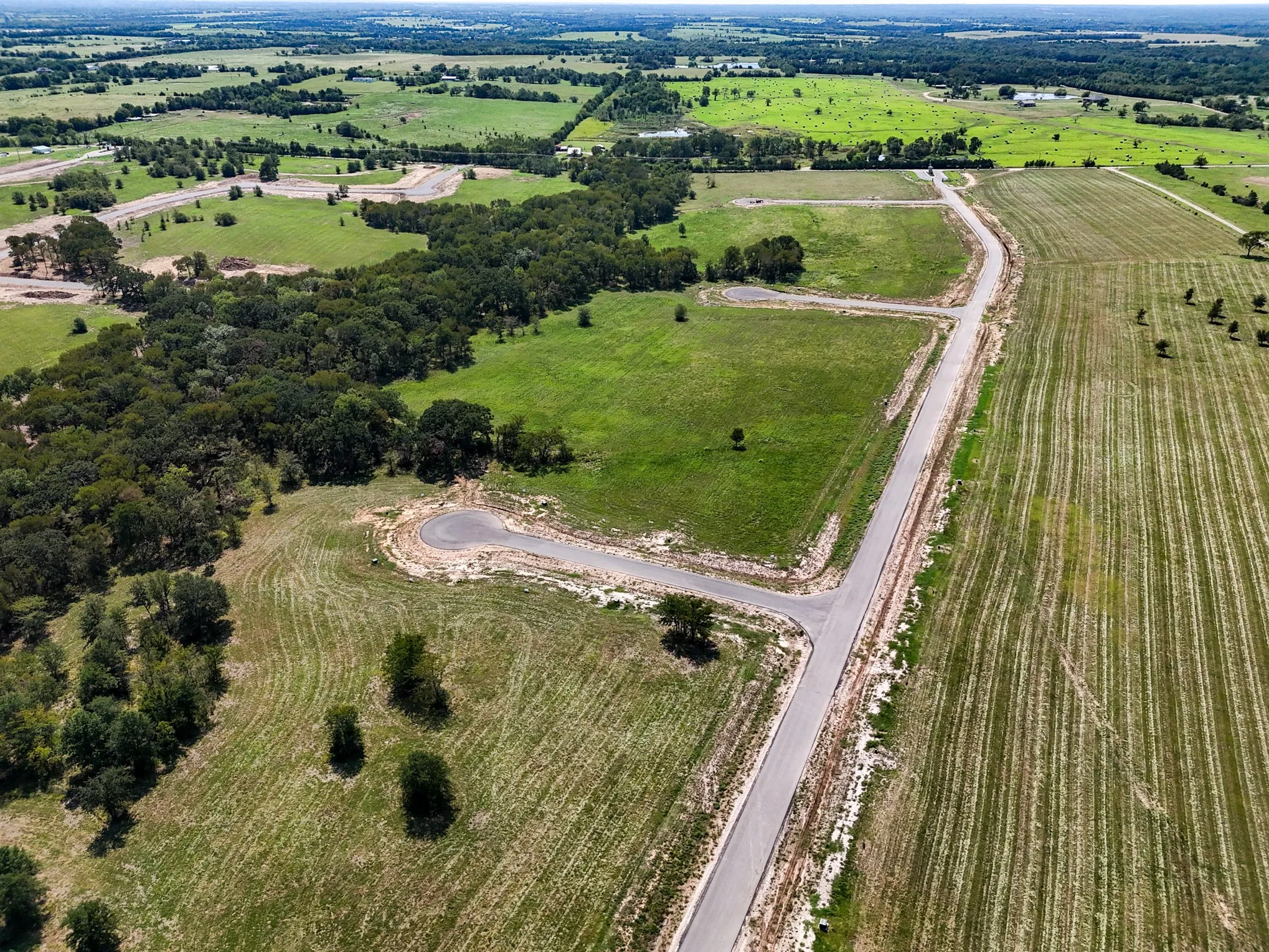 Aerial view of property and surrounding area with rural landscape and abundant farmland
