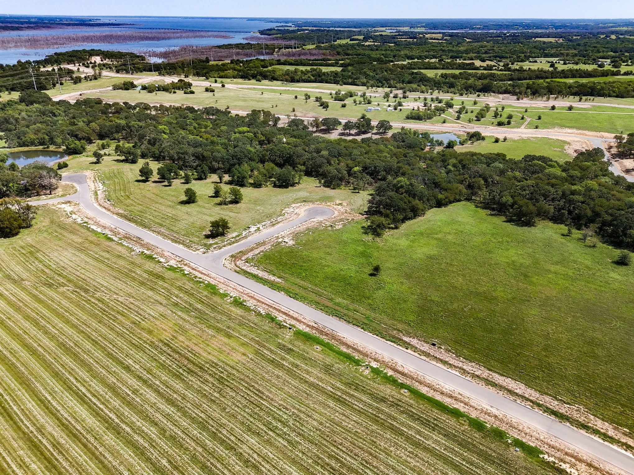 View of rural area with a nearby body of water