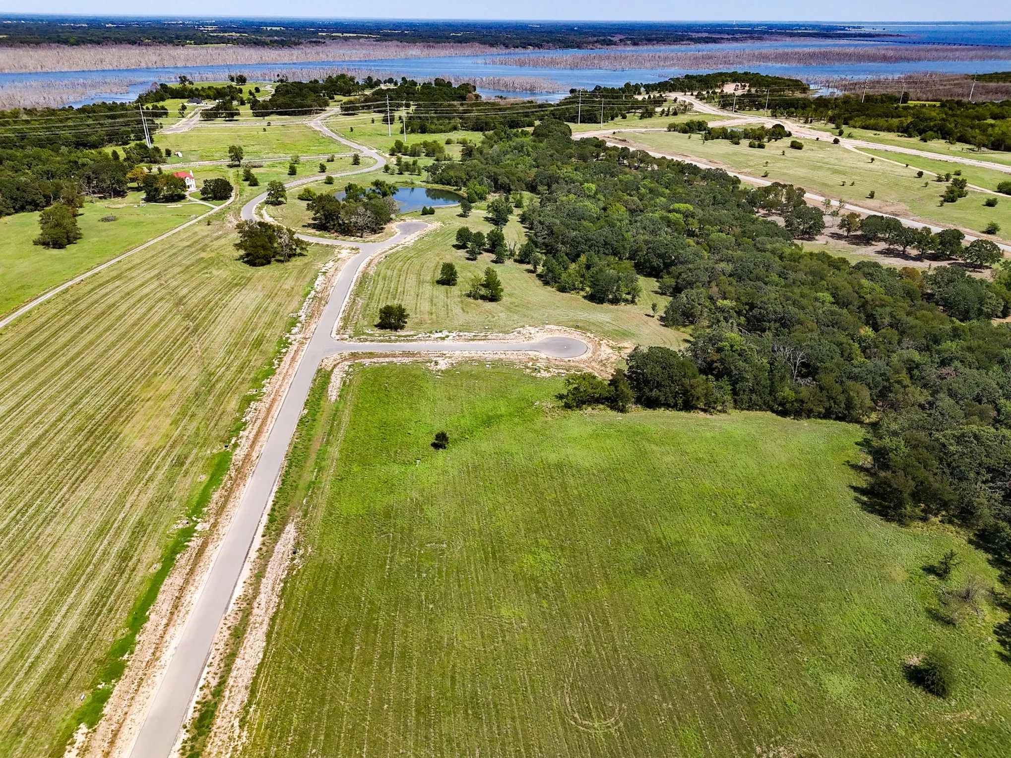 View of property location with a nearby body of water