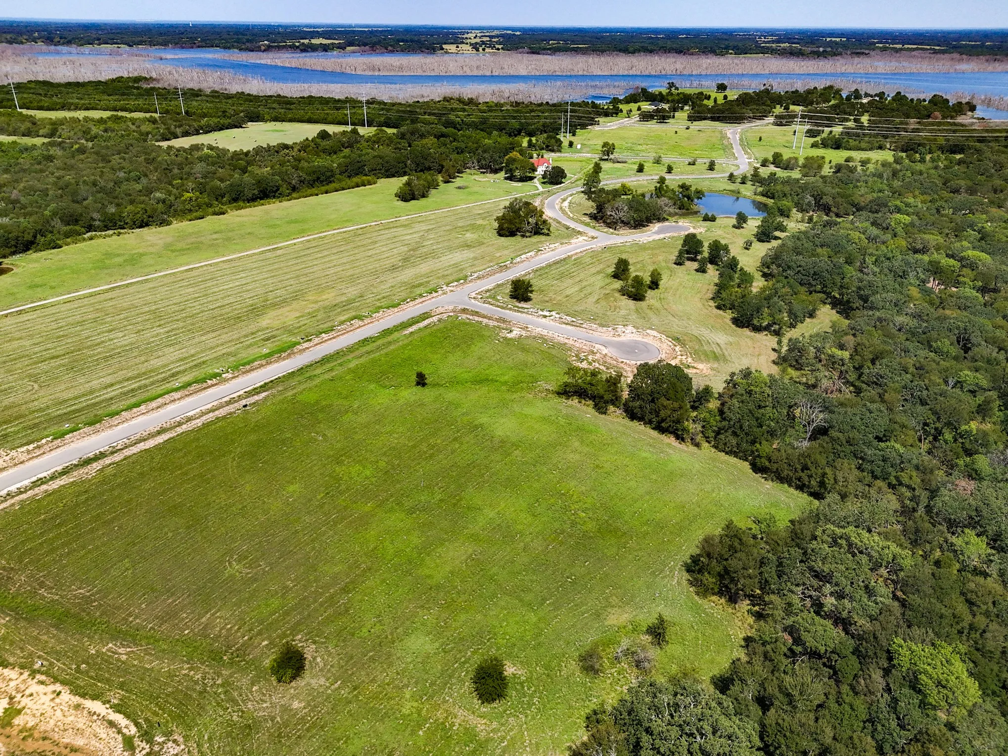 View of property location with a large body of water
