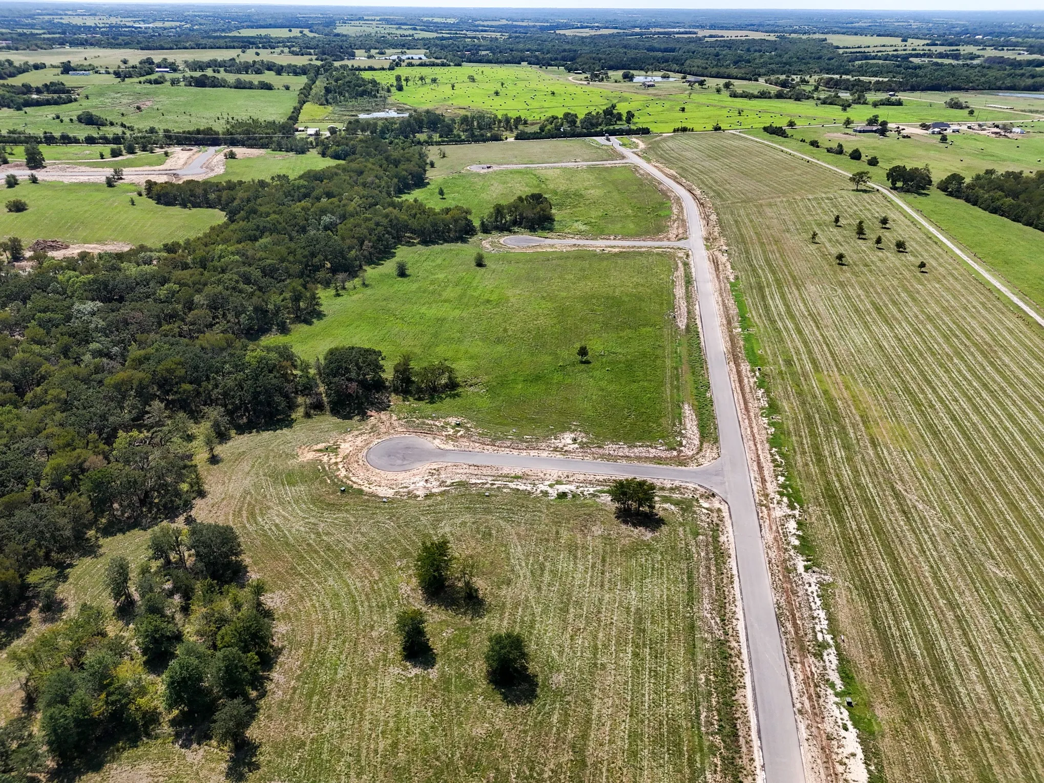 Aerial overview of property's location with rural landscape