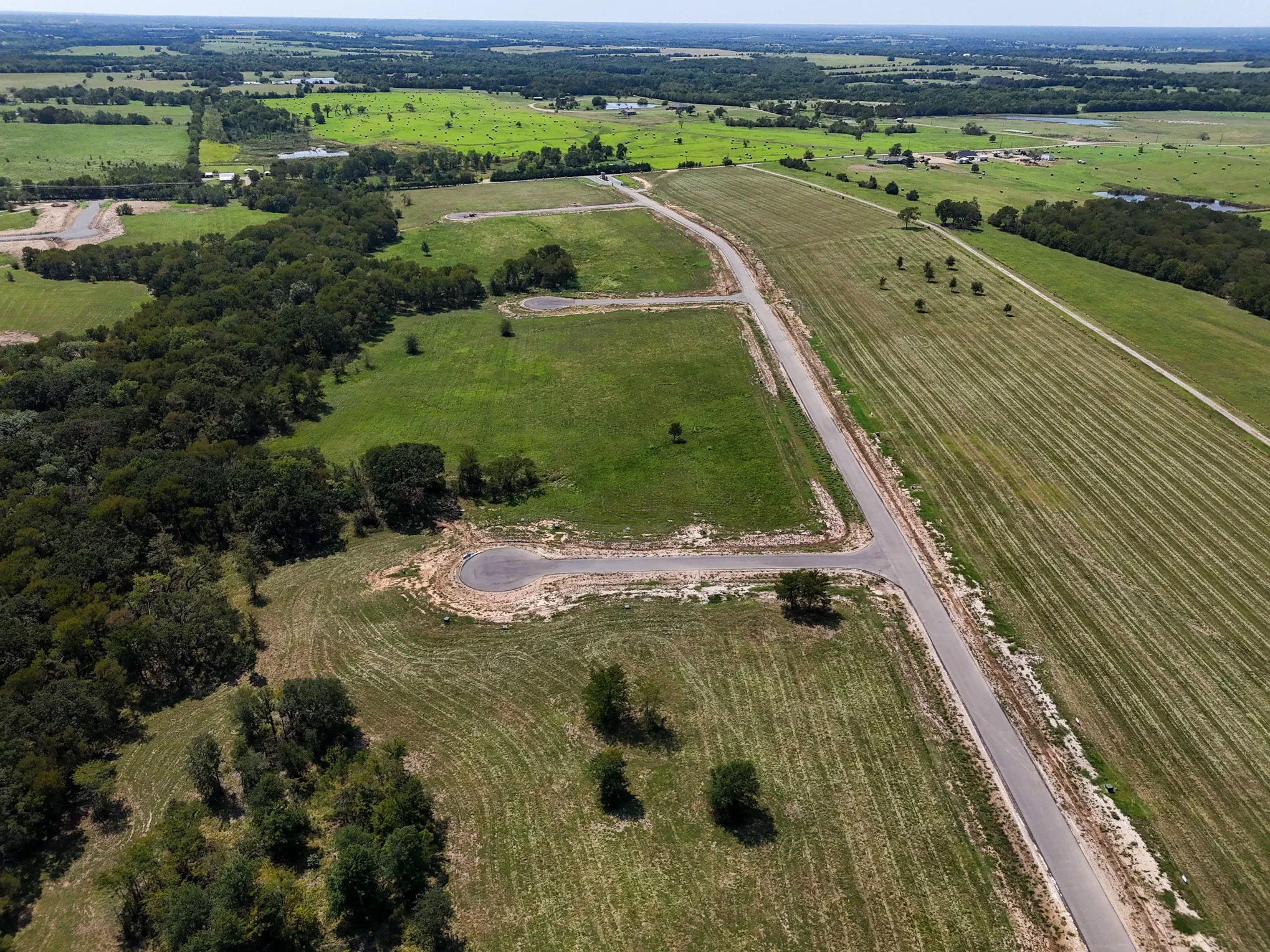 Aerial view of property's location with rural landscape