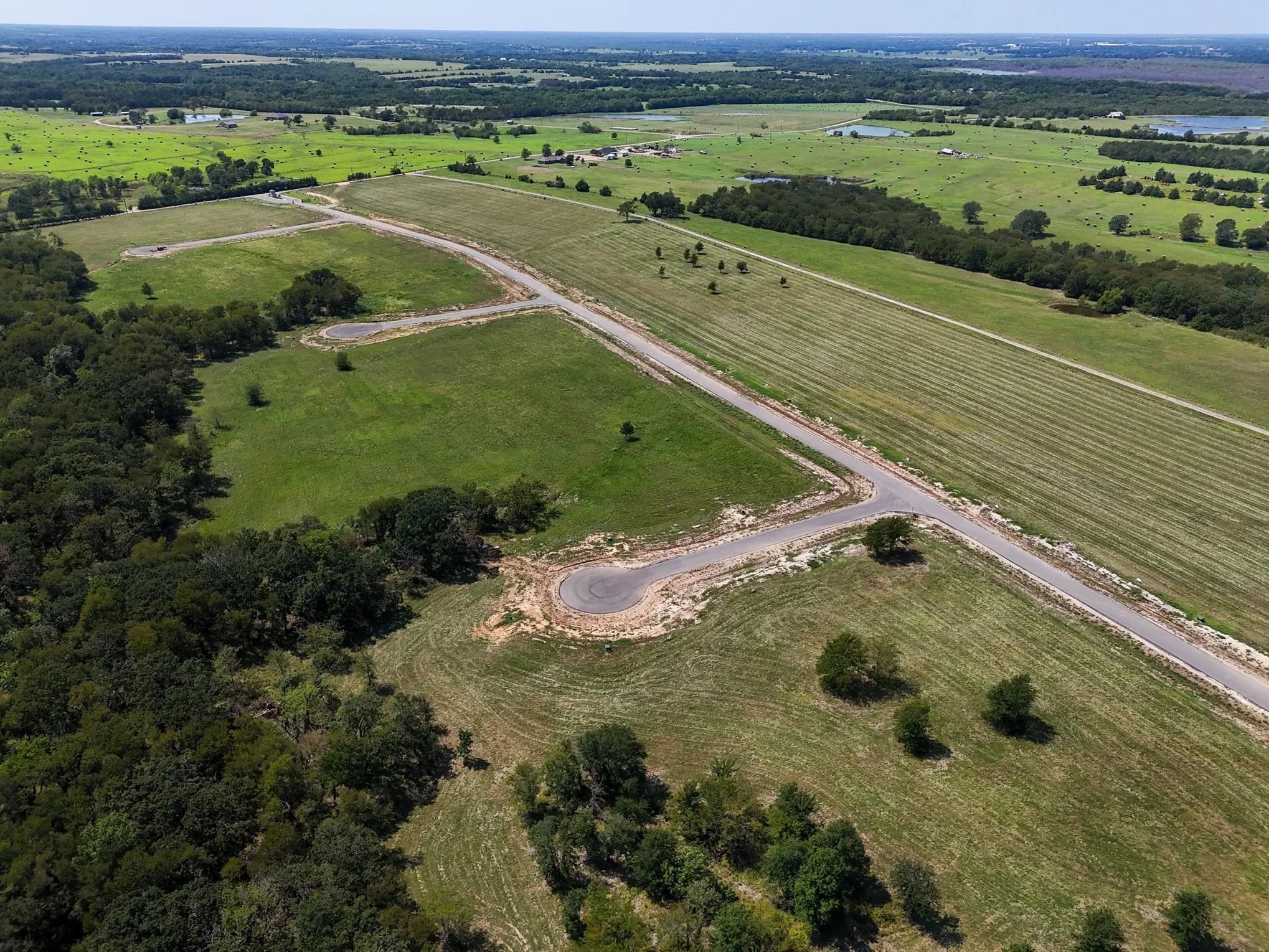 Aerial overview of property's location with rural landscape