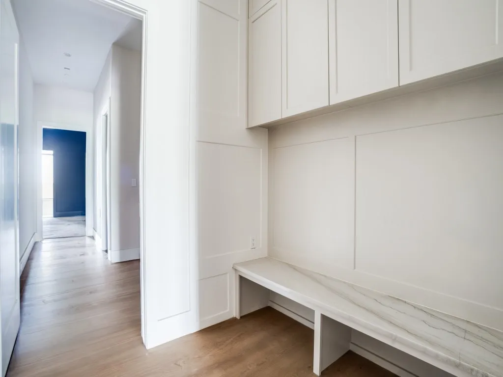 Located near the garage entry and dumb waiter, this area is perfect for backpacks, jackets, shoes, and storage.