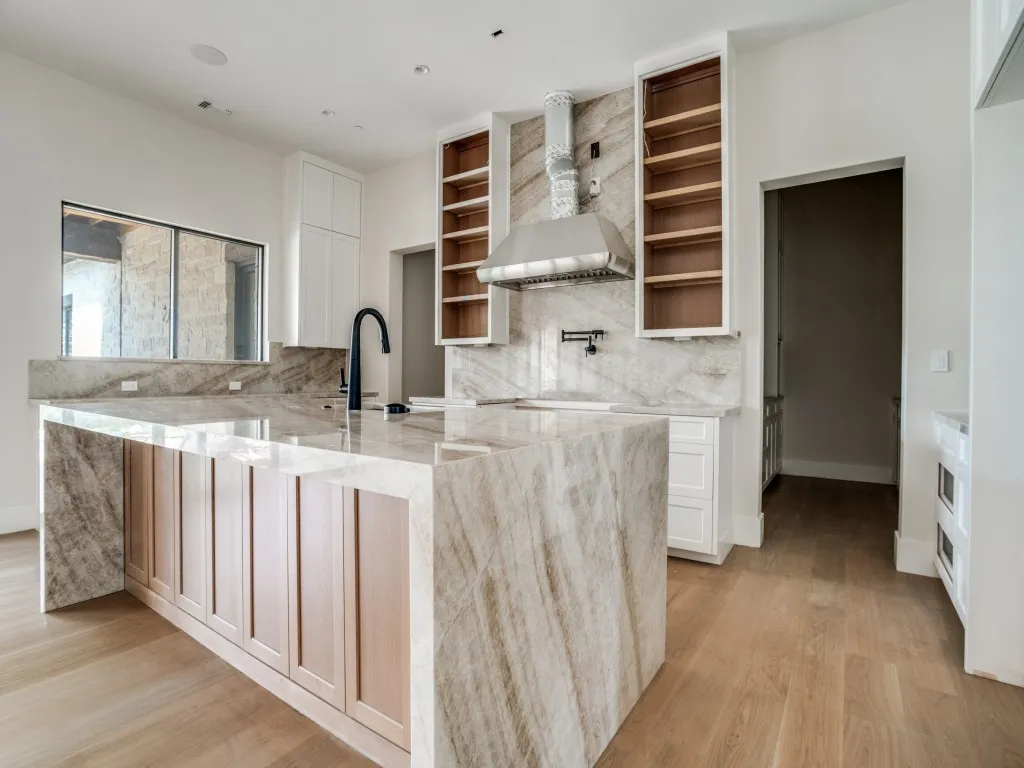 The kitchen is waiting for your finish out. Dual pantries and prep-kitchen are ready for your finishing touches.