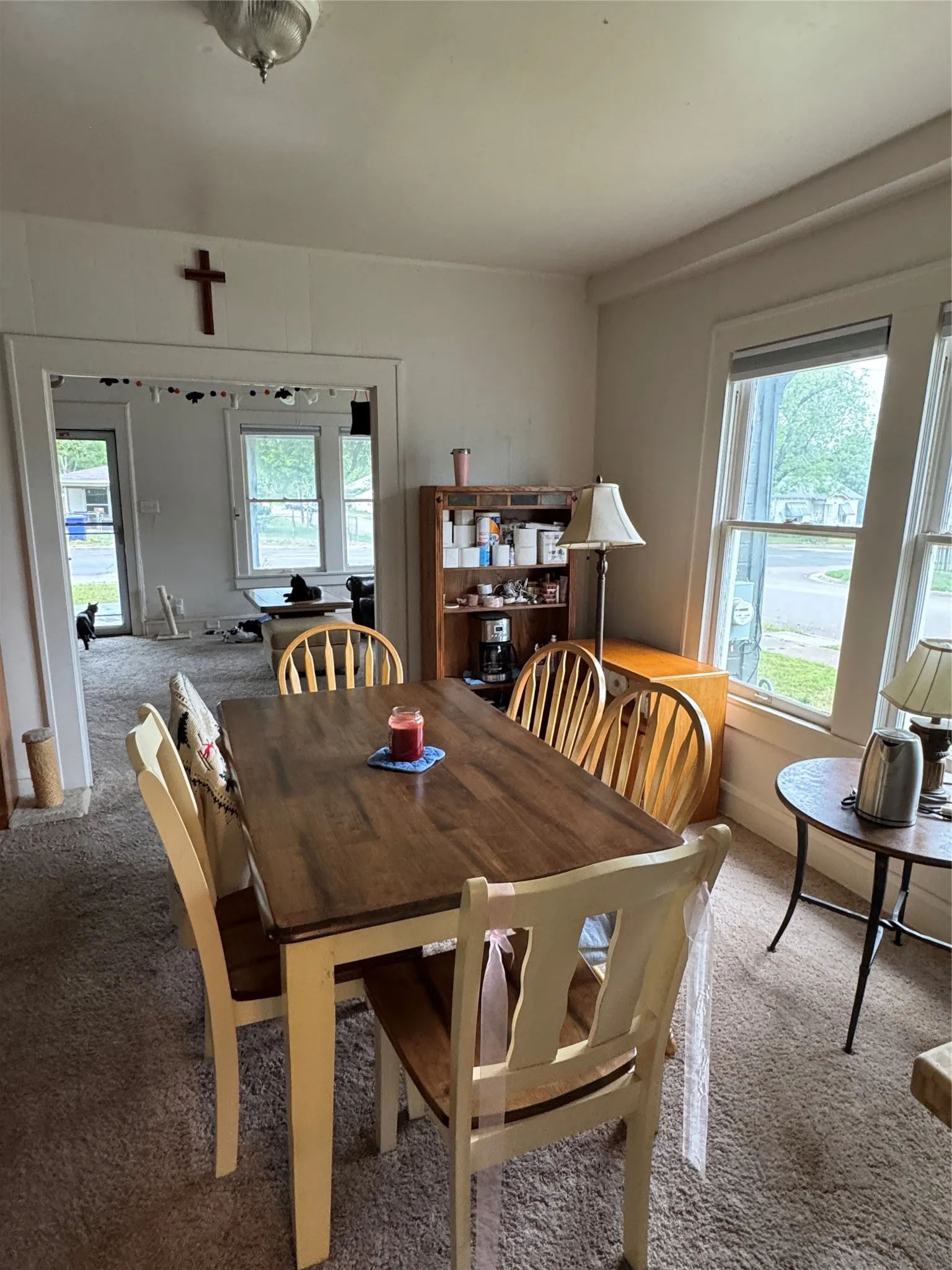 Dining area featuring carpet flooring and healthy amount of natural light