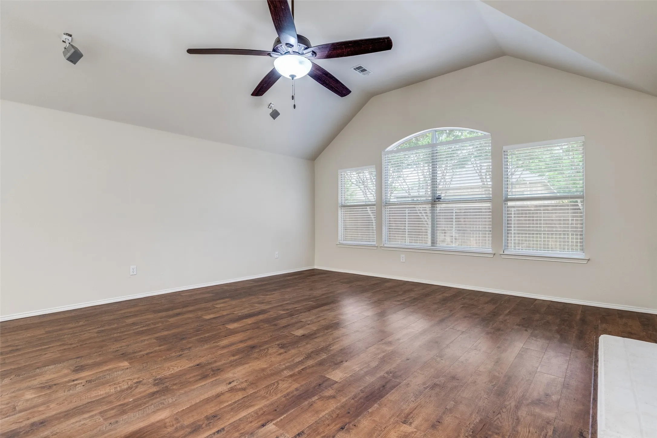 Wall of windows provides plenty of natural light for huge primary living area.