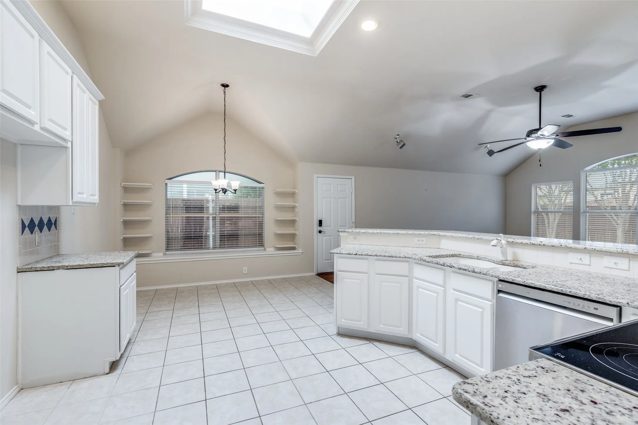 Skylight and recessed lighting package make for a kitchen that is both light and bright.