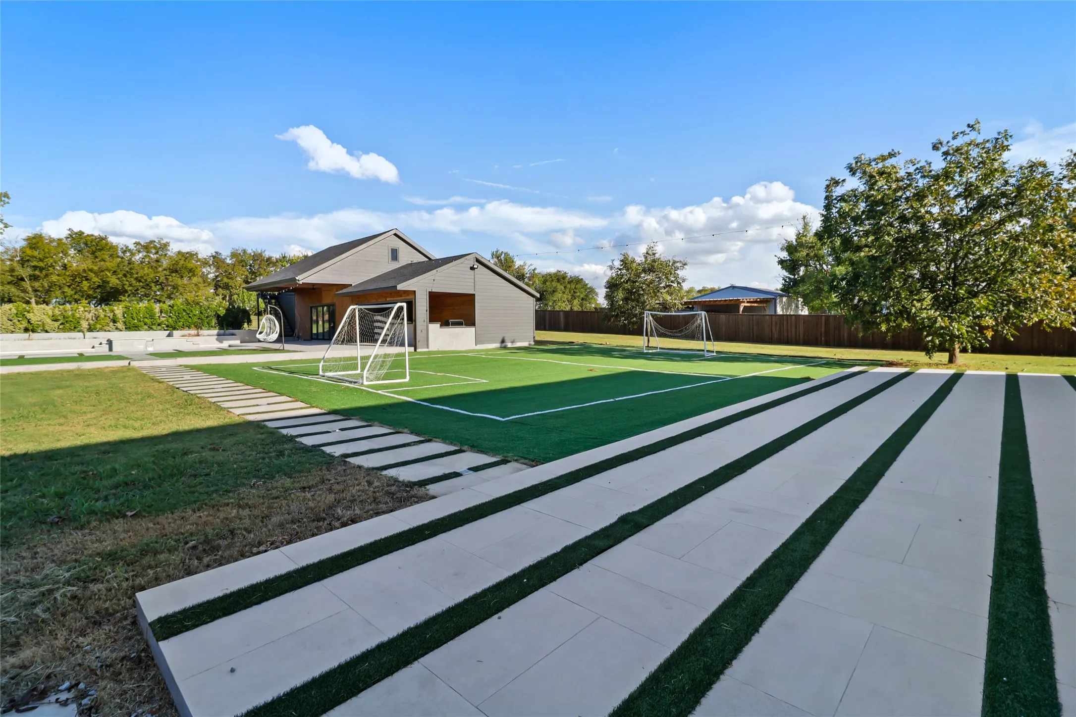 View of property's community featuring an area for soccer