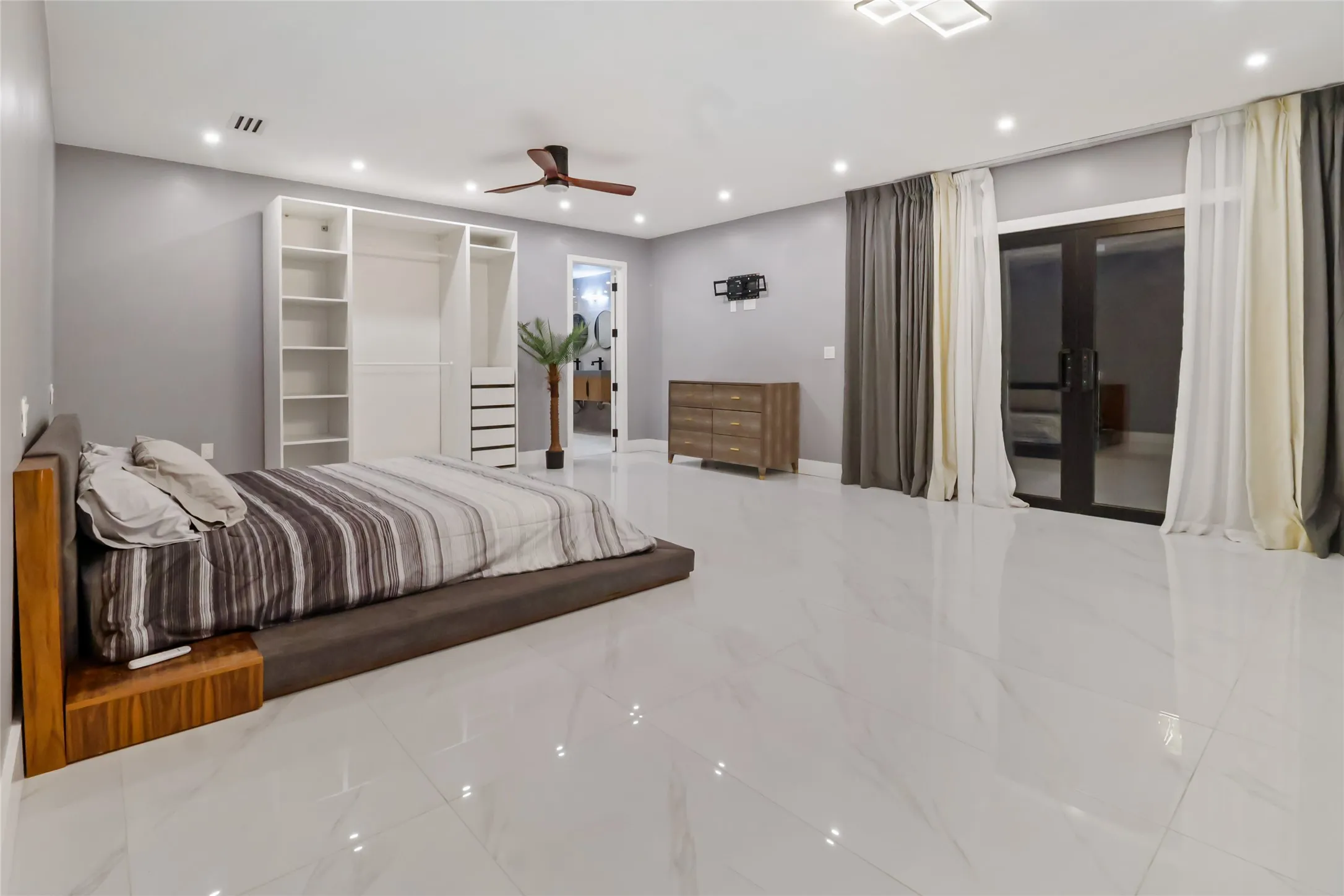 Bedroom with access to outside, recessed lighting, and ceiling fan