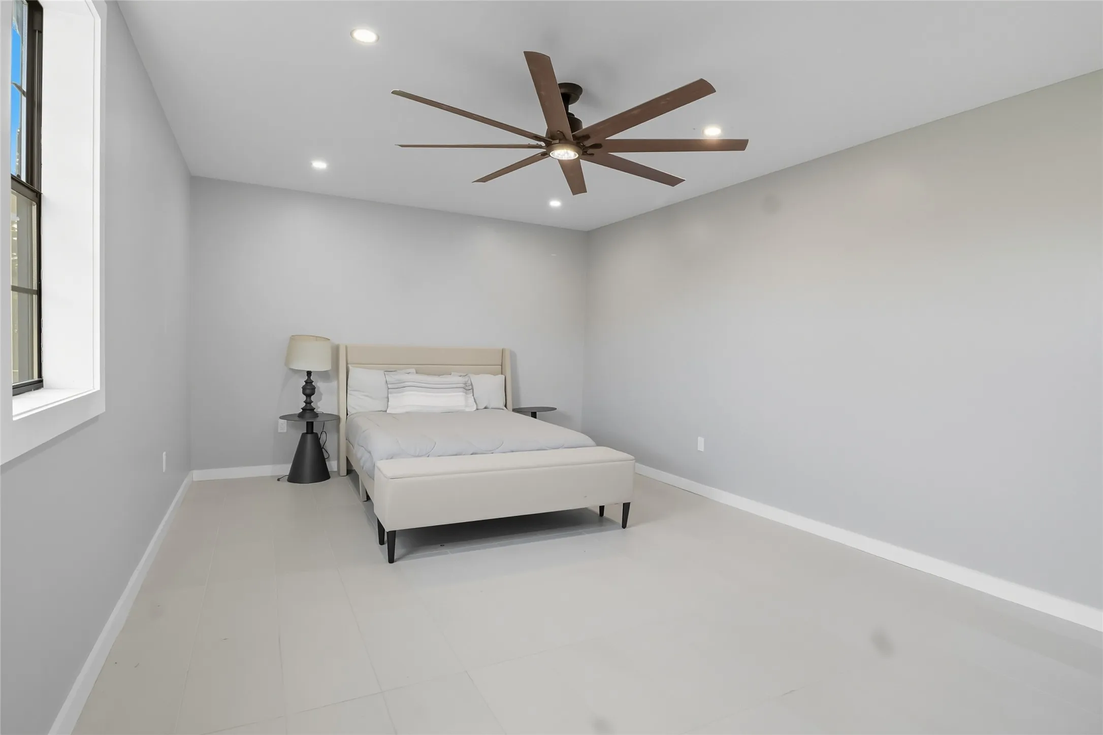 Bedroom featuring ceiling fan and recessed lighting