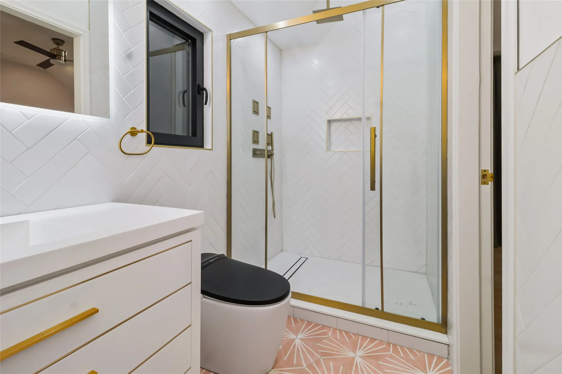 Full bath with vanity, a stall shower, tile walls, and light tile patterned floors