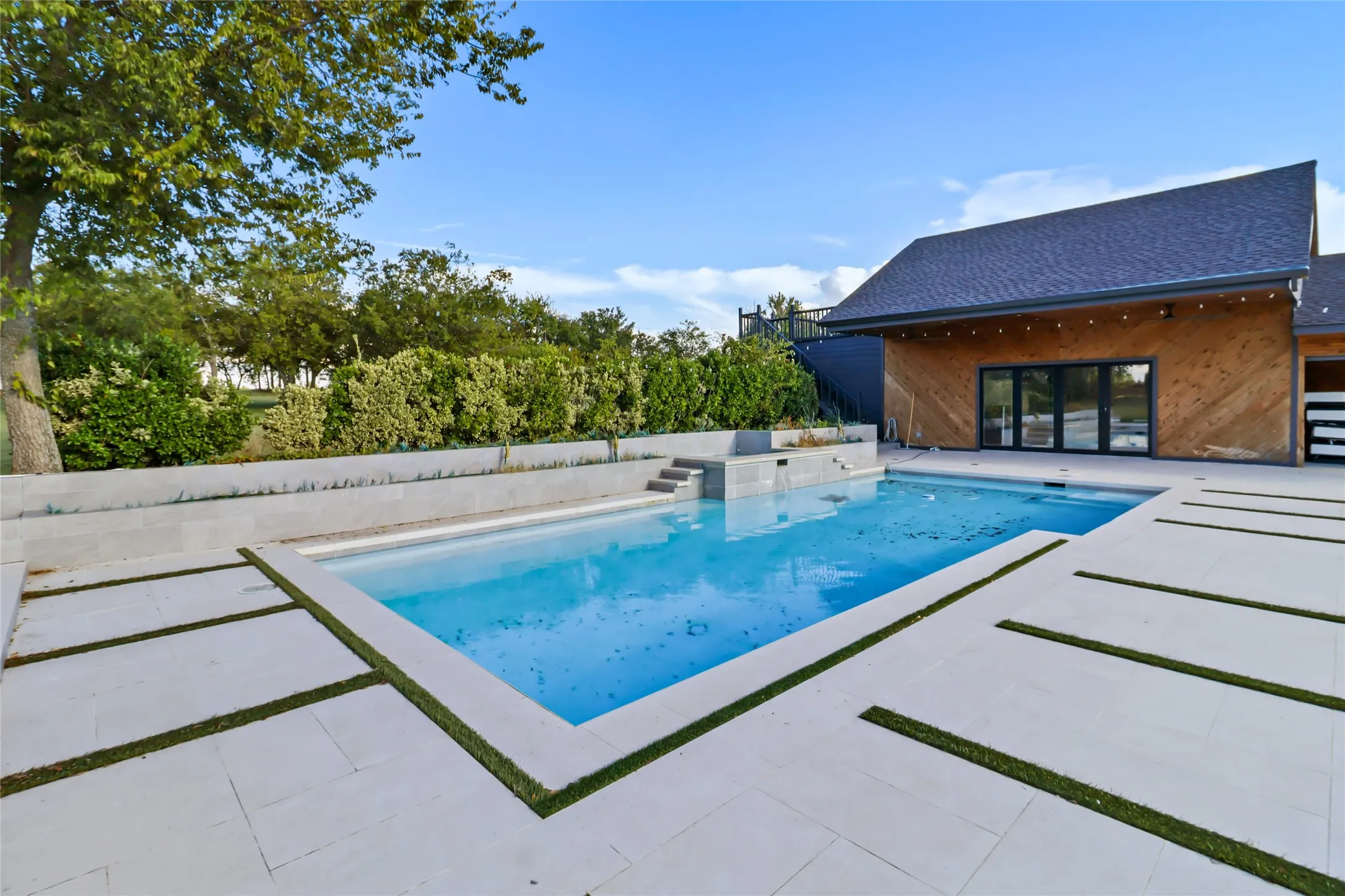 Outdoor pool featuring a patio area