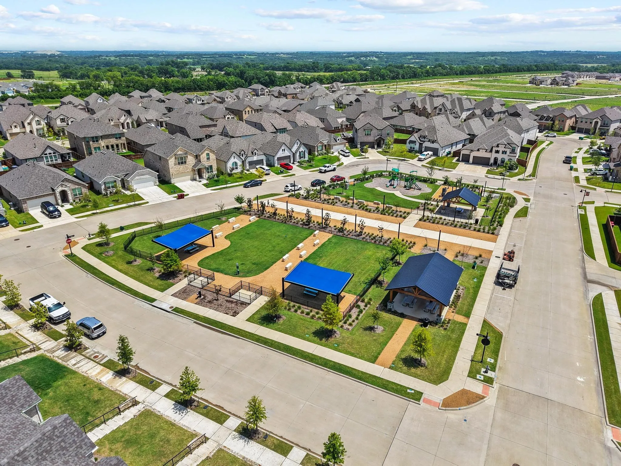 Off-Leash Dog Park, Fitness Stations, Play Structure, Picnic Pavillions and Promenade