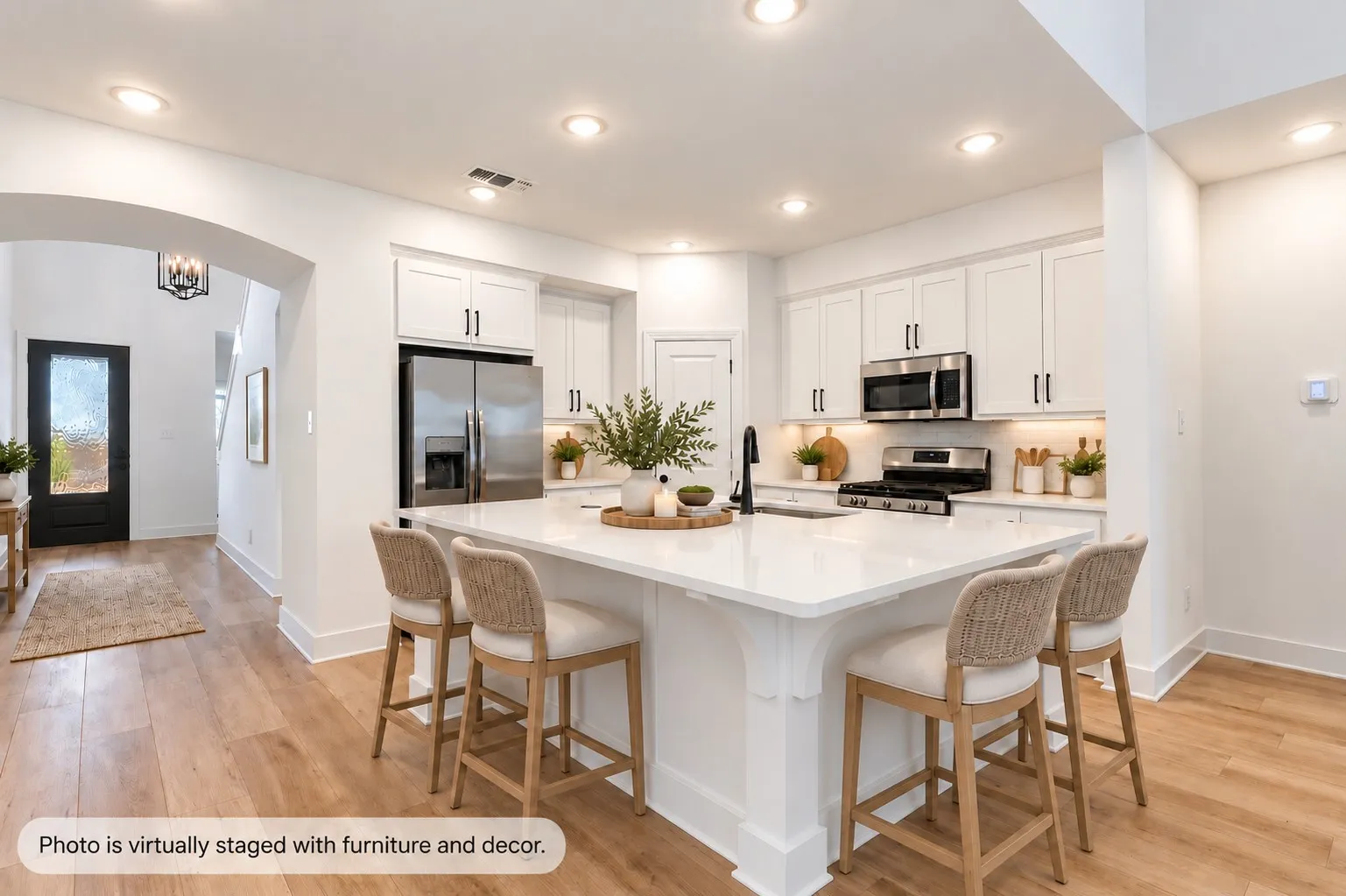The Huge Quartz-Top Island Provides Casual Dining and Prep Space.