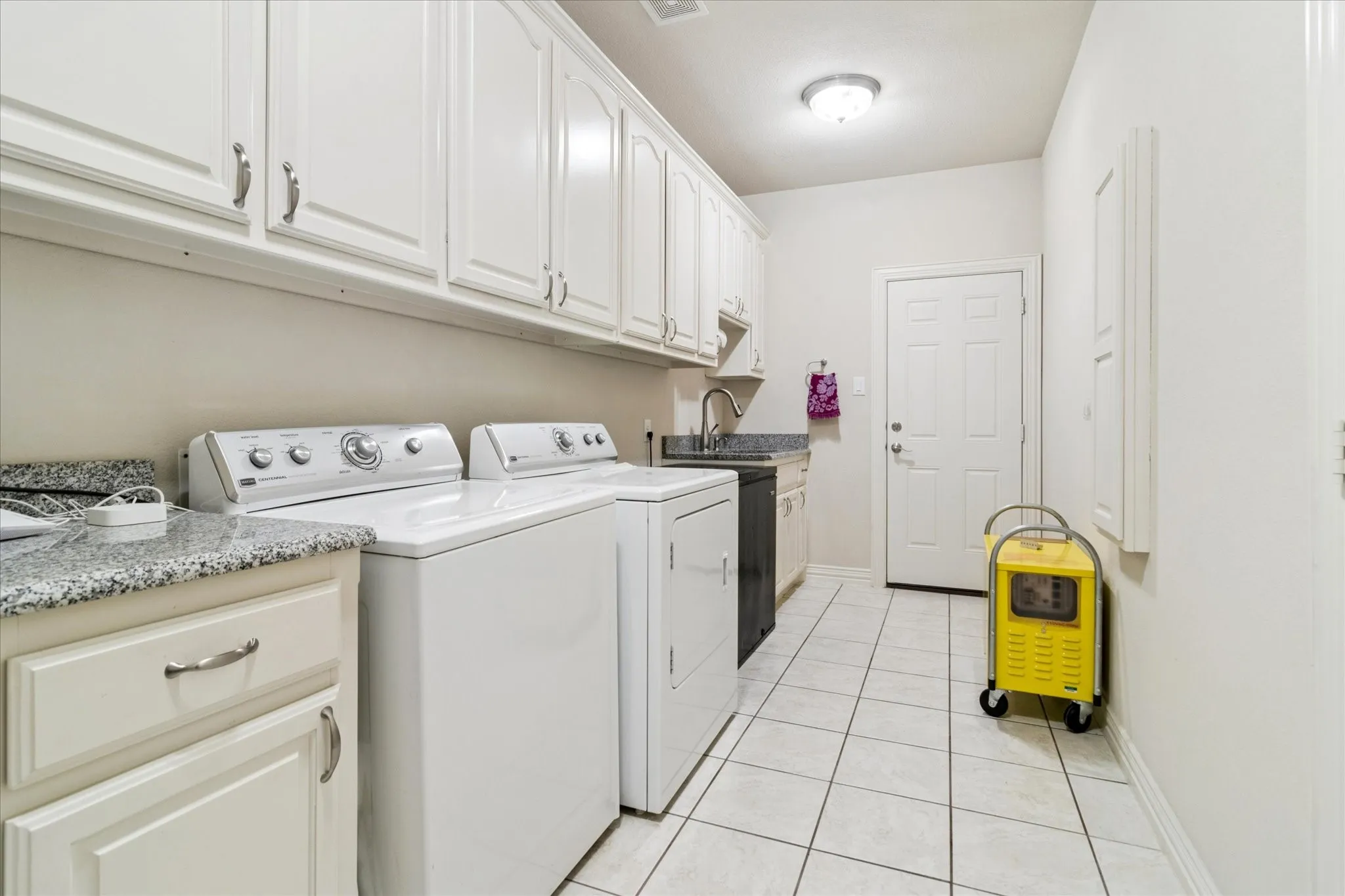 Huge Laundry Room,
Shared by both Homes