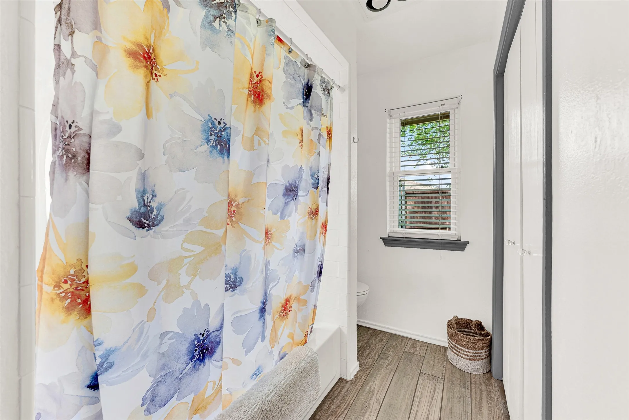 Full tub and shower and Closet in this view of the primary Bath.