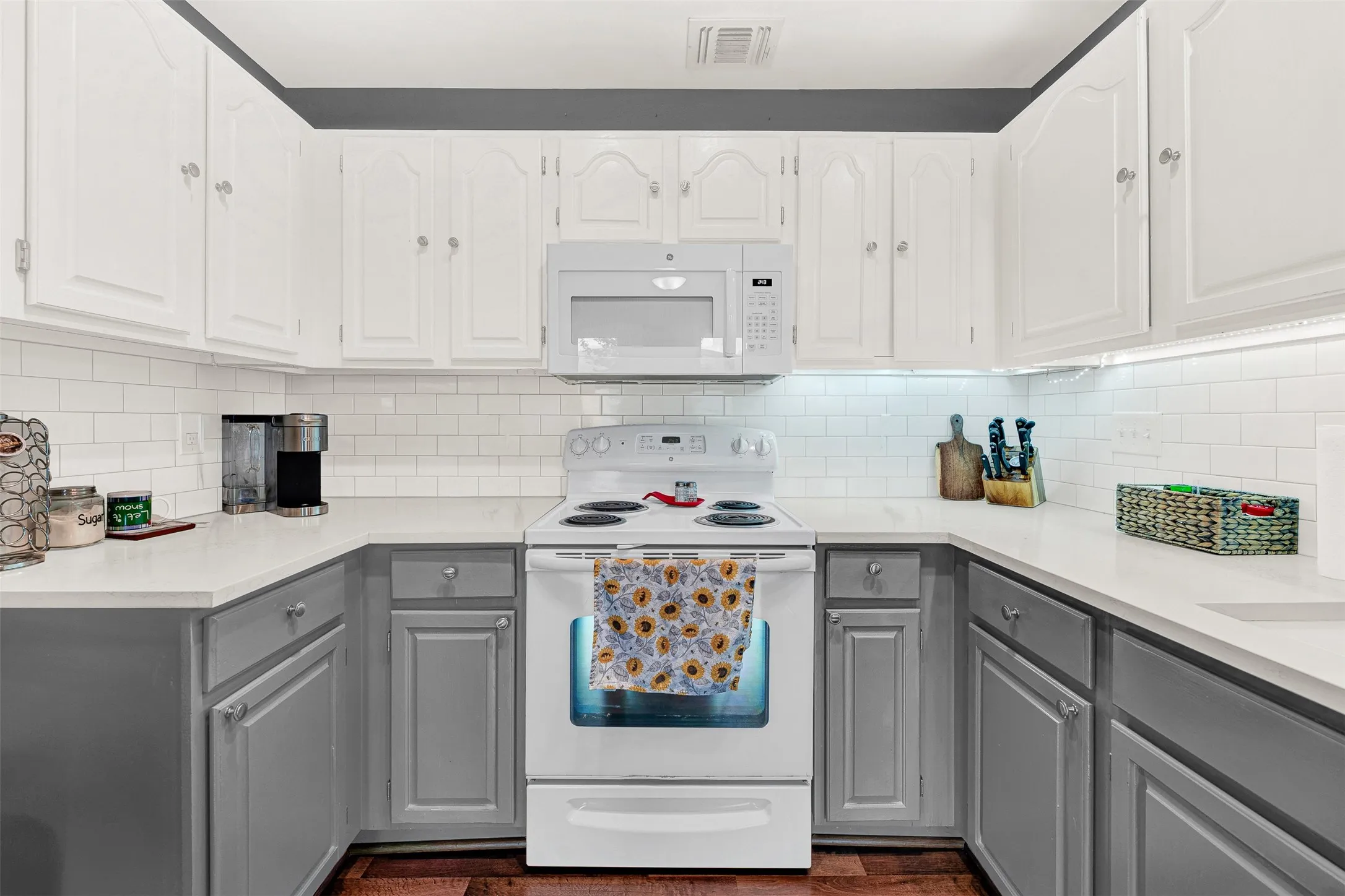 Lots of counter space and storage in this updated kitchen.