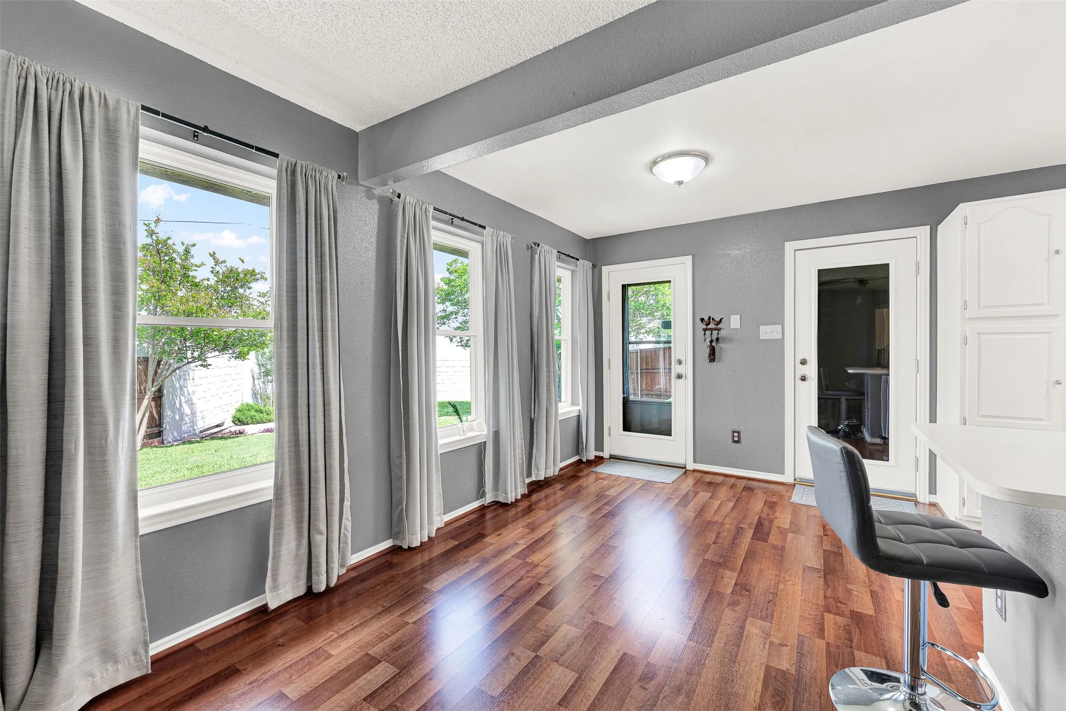 Light & bright dining area has great views of the BIG landscaped backyard.