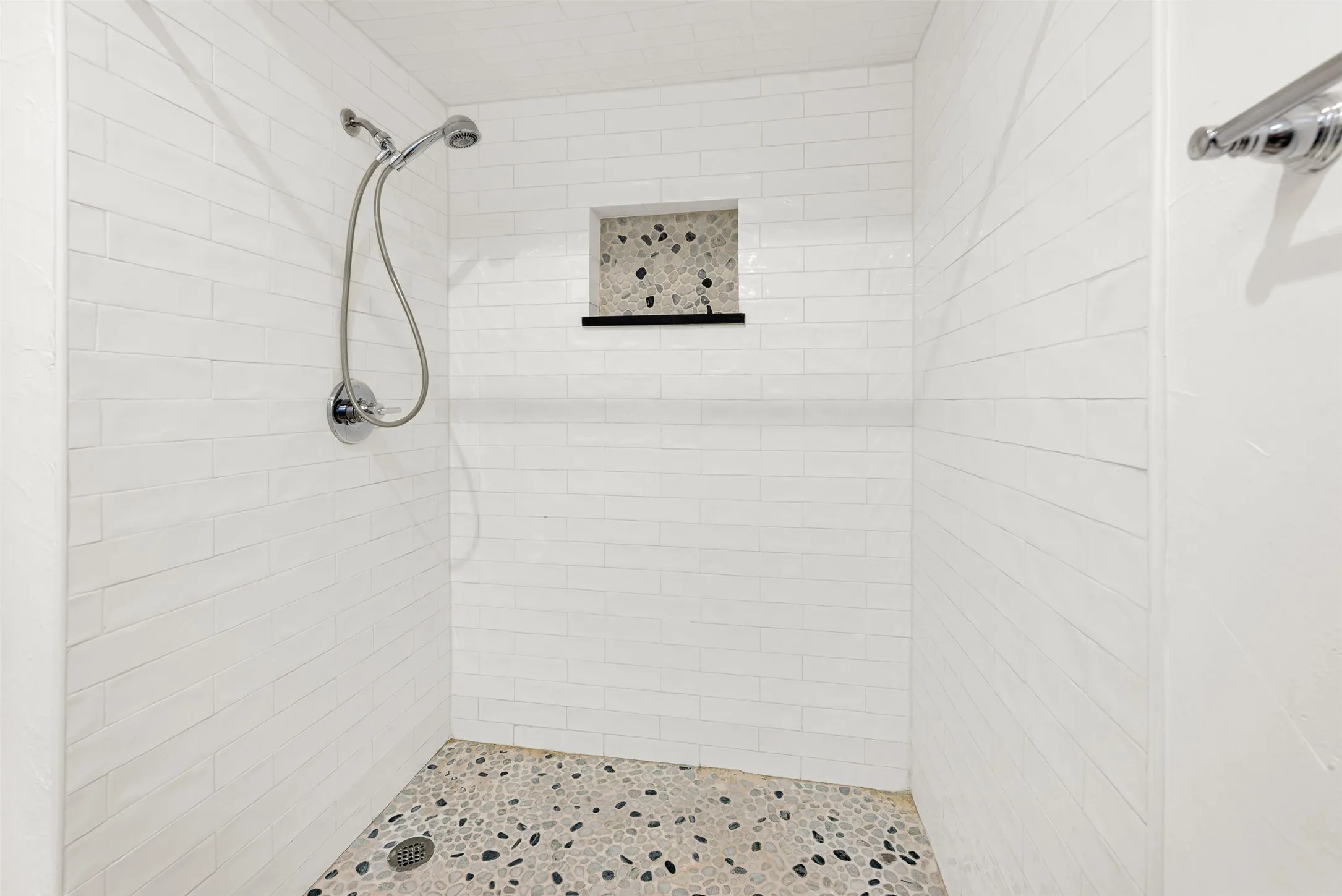 Nice walk in shower in the Hall bathroom