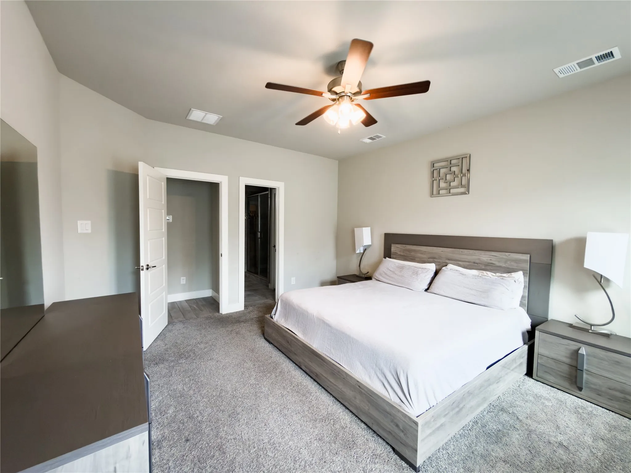 Bedroom with carpet flooring and ceiling fan