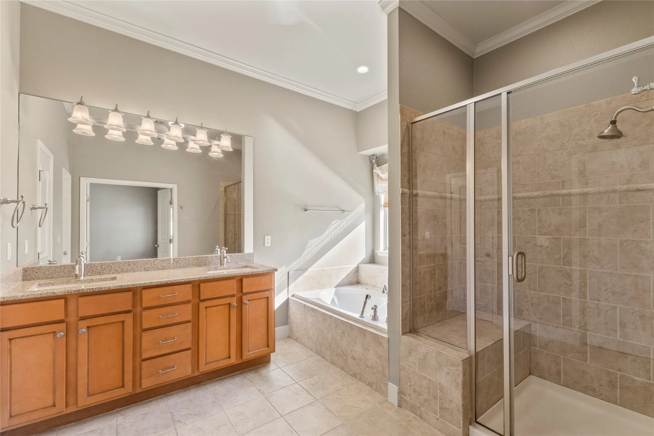 Double sink vanity, separate tub and walk in shower