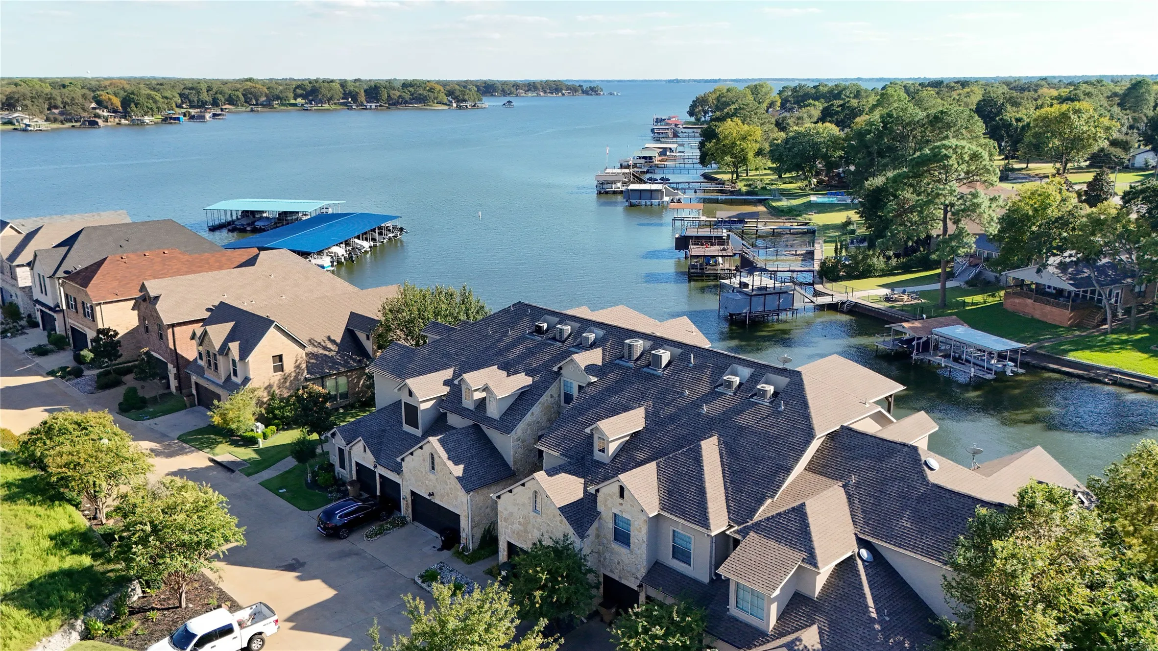 Townhouse For Sale in Henderson County , 124 Marina Drive, Gun Barrel City, Texas 75156, 4 Bedrooms, 3 Bathrooms, 2 Garage spaces, 2,170 Sqft, built in 2008, Preowned, Price $599,000, mls#21235258, Real Estate Agent in Gun Barrel City, Homes For Sale in Henderson county, Homes For Sale in Gun Barrel City, Realtor in Gun Barrel City Texas, Real Estate Brokerage Independent Realty Texas, Luminita Cordes Realtor