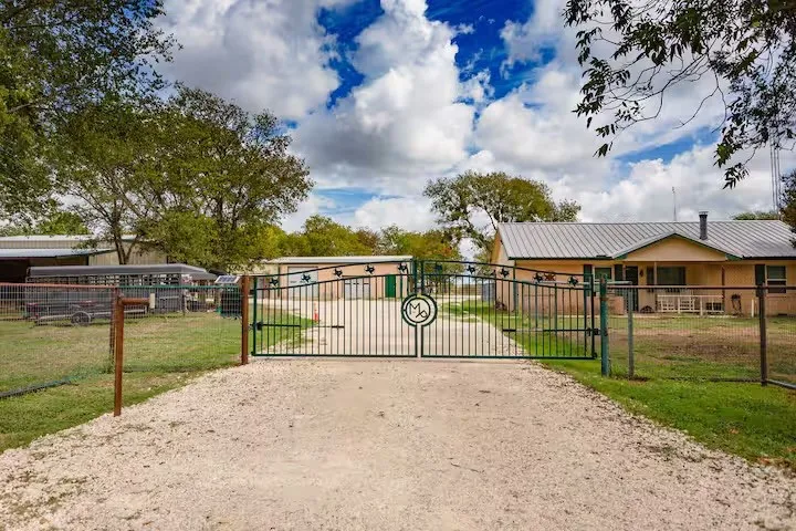 Gate with a fenced front yard
