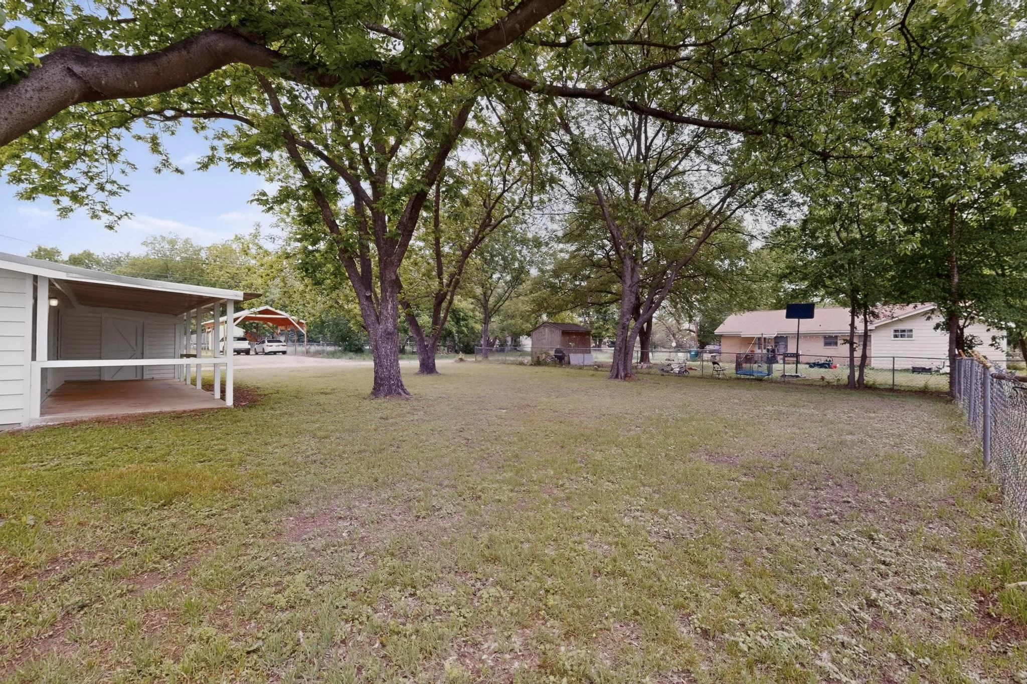 Large yard with great shade trees.