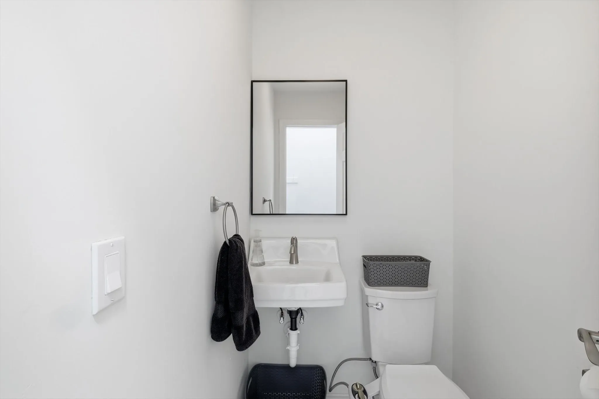 This half bath is downstairs and has been added by the owners to create a true 2 full dedicated bedrooms and bathrooms downstairs so this bath can be used for guests only.
