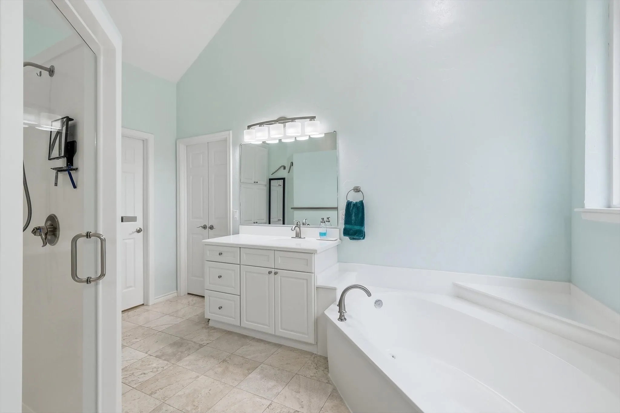 Oversized two person shower with multiple shower heads