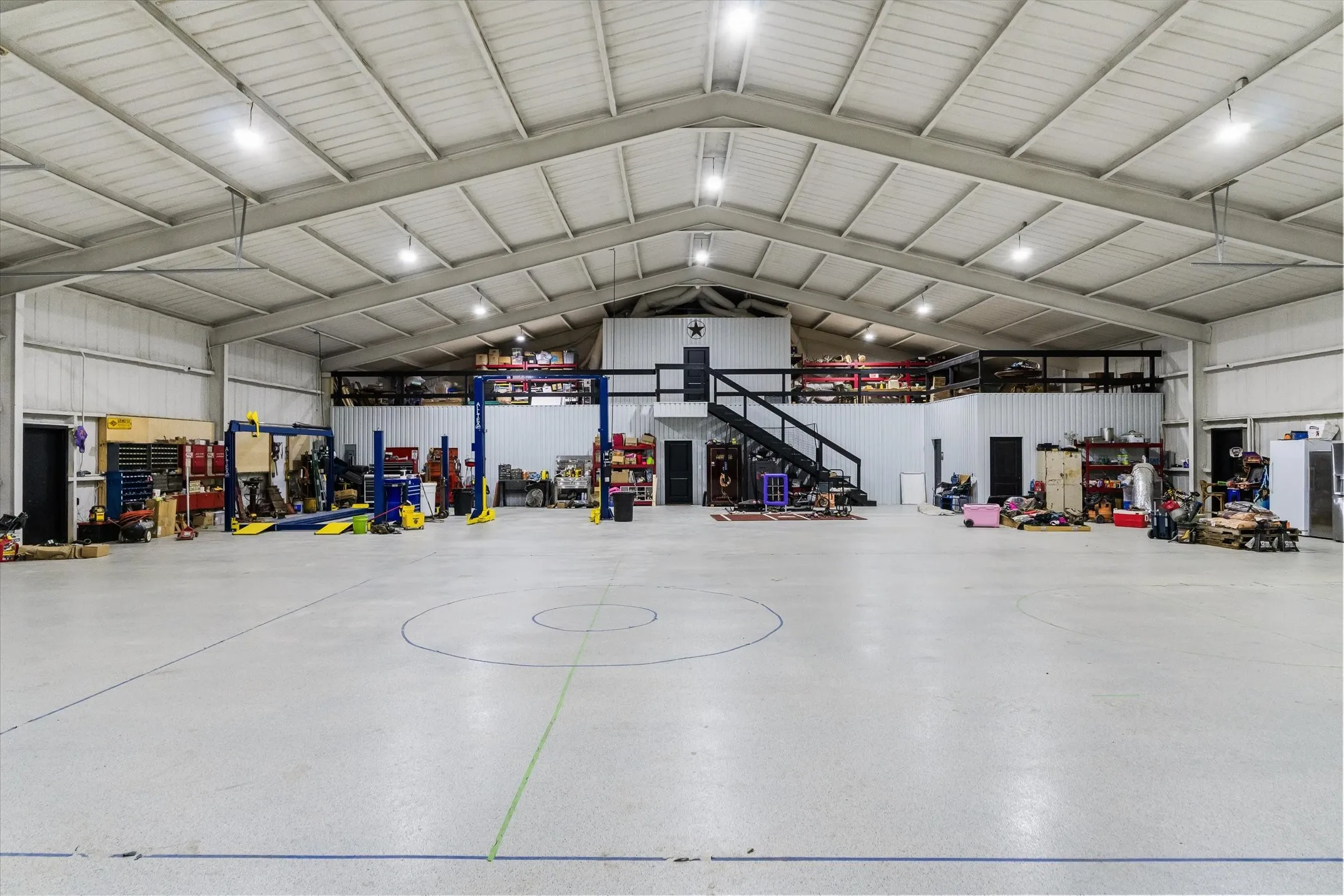 Half basketball court and plenty of room for many possibilities