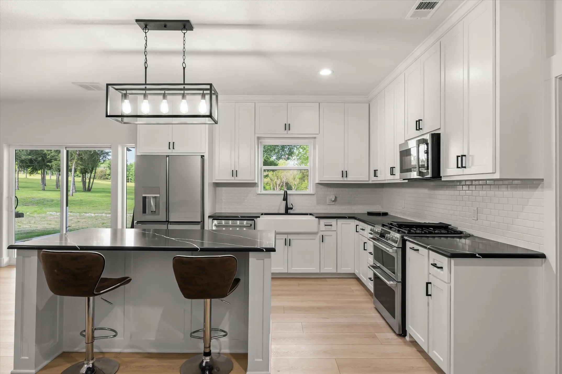 Barndo kitchen with quartz countertops and state of the art appliances