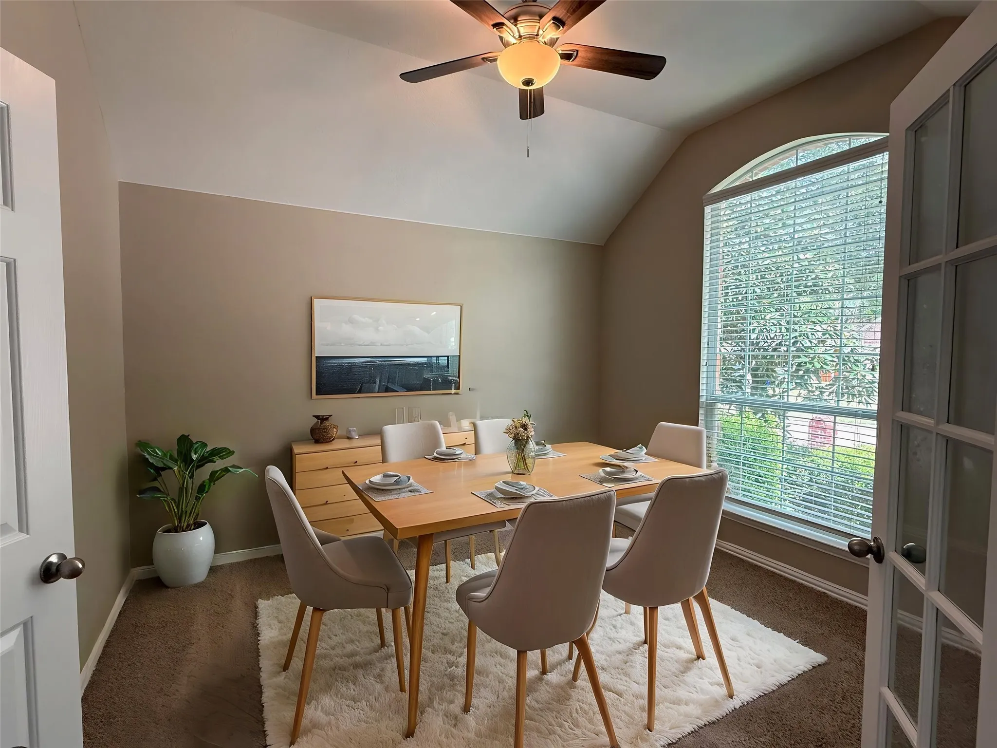VIRTUAL STAGED - Bonus room off of kitchen can be used as a dining room or office