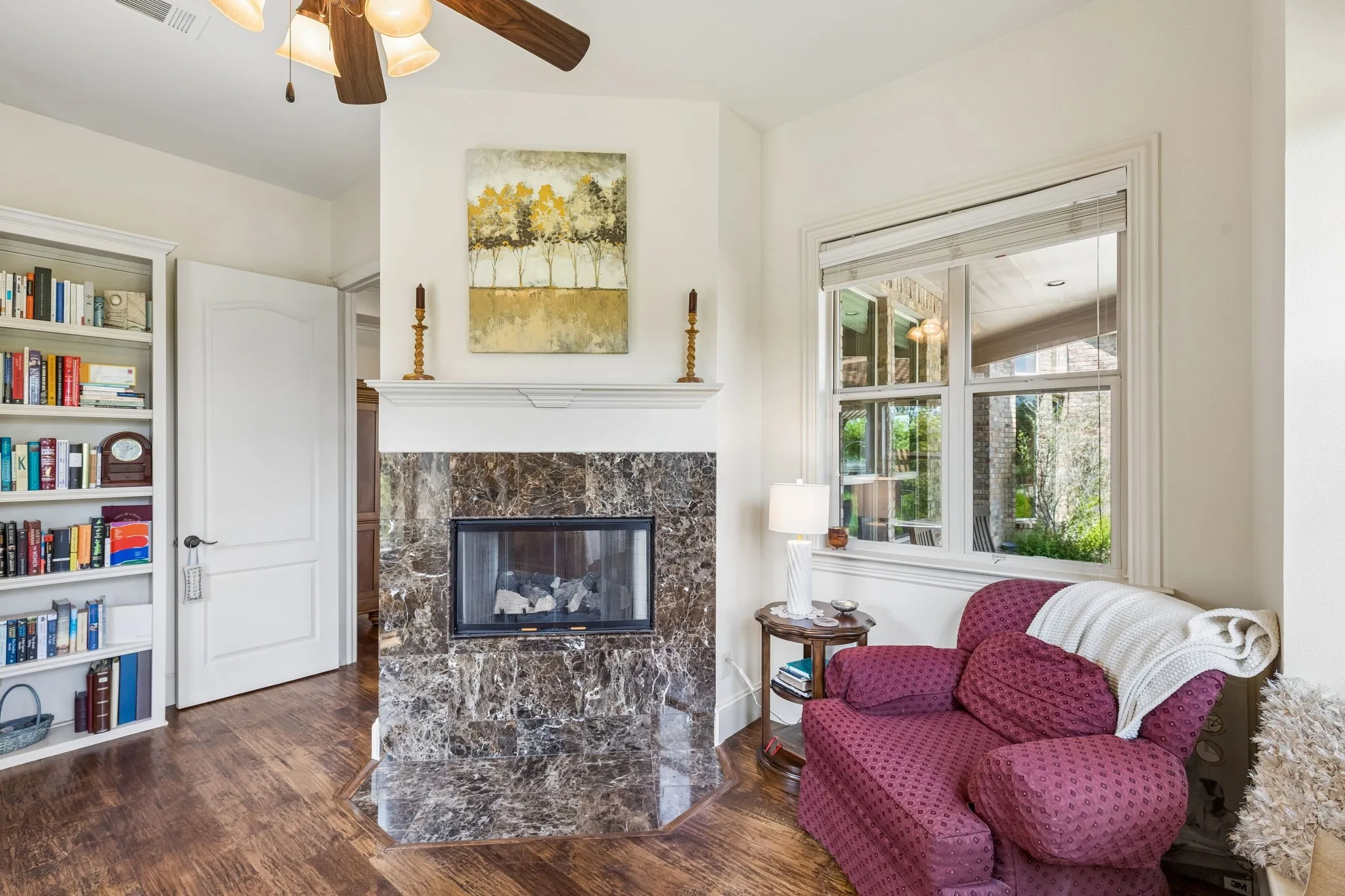 This desk area with cabinetry is right off of the Primary Bedroom a great library niche