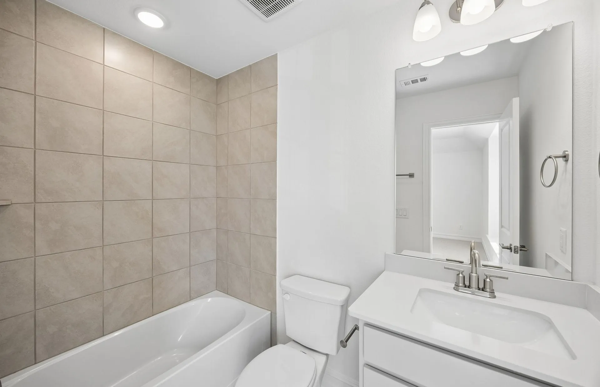 Secondary bath with tile surrounded shower