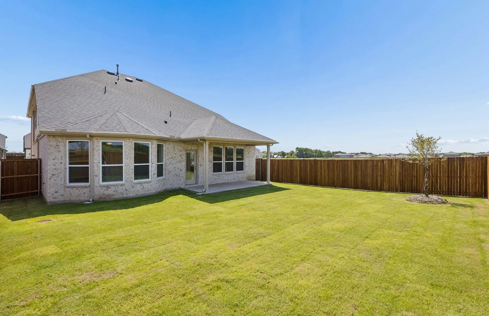 Oversized fenced in backyard