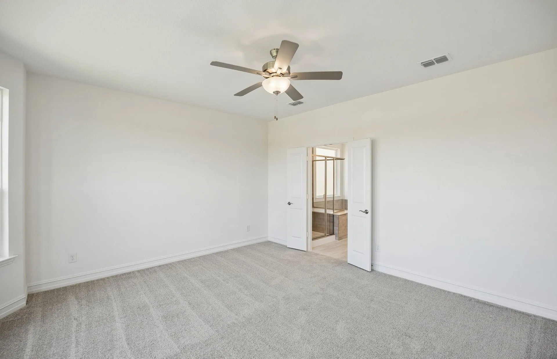 Spacious primary bedroom